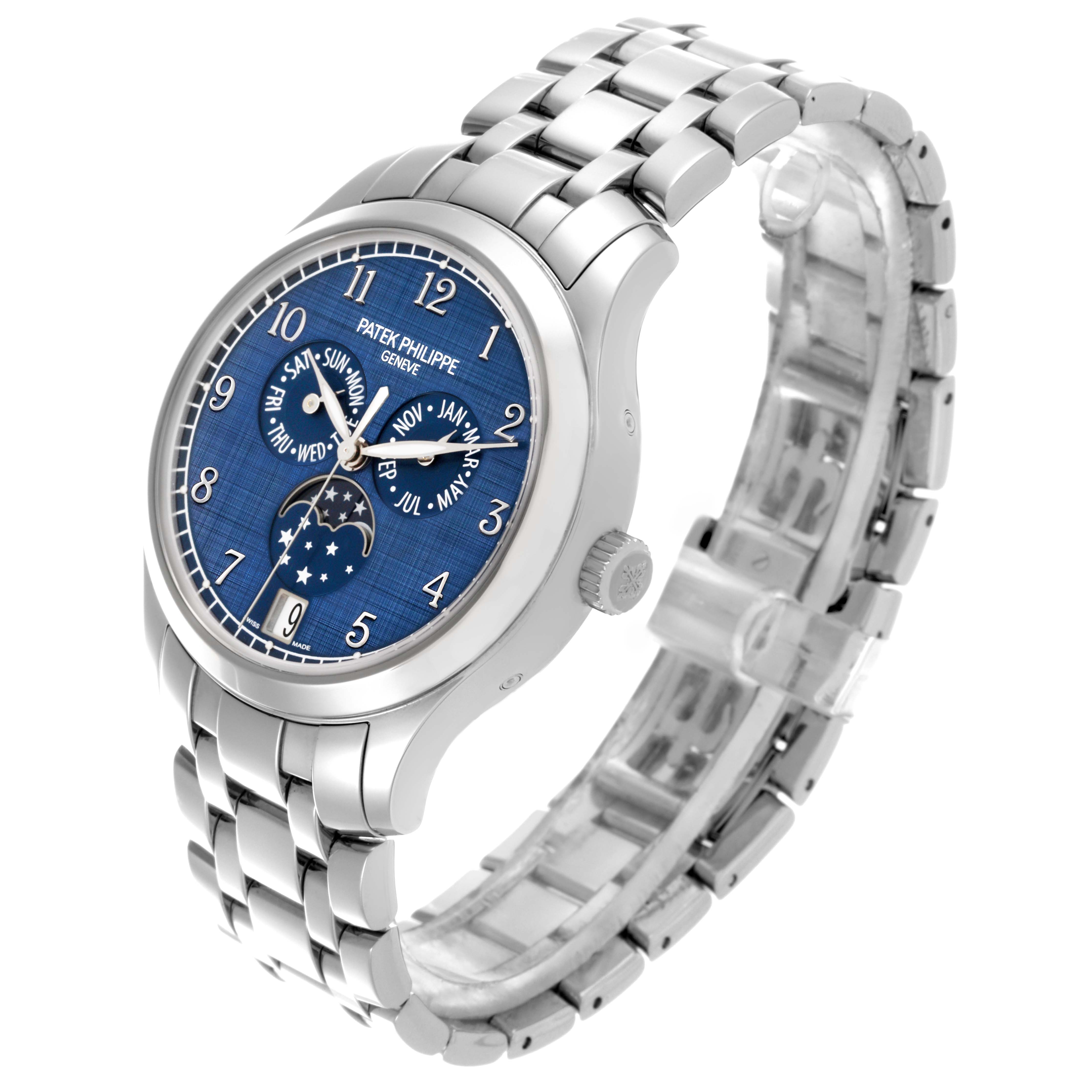 The Patek Philippe Complications 4947/1A-001 Men's Stainless Steel Blue Dial 4947/1A-001 Men's Stainless Steel Blue Dial watch is shown at an angled view, highlighting its blue dial, silver case, and bracelet.