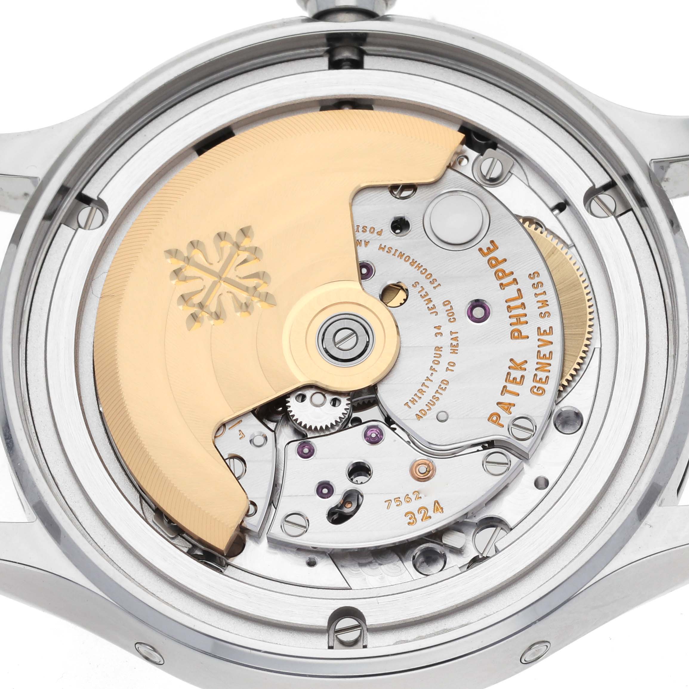 The image shows the back of the Patek Philippe Complications 4947/1A-001 Men's Stainless Steel Blue Dial 4947/1A-001 Men's Stainless Steel Blue Dial model, highlighting its movement and intricate mechanisms.