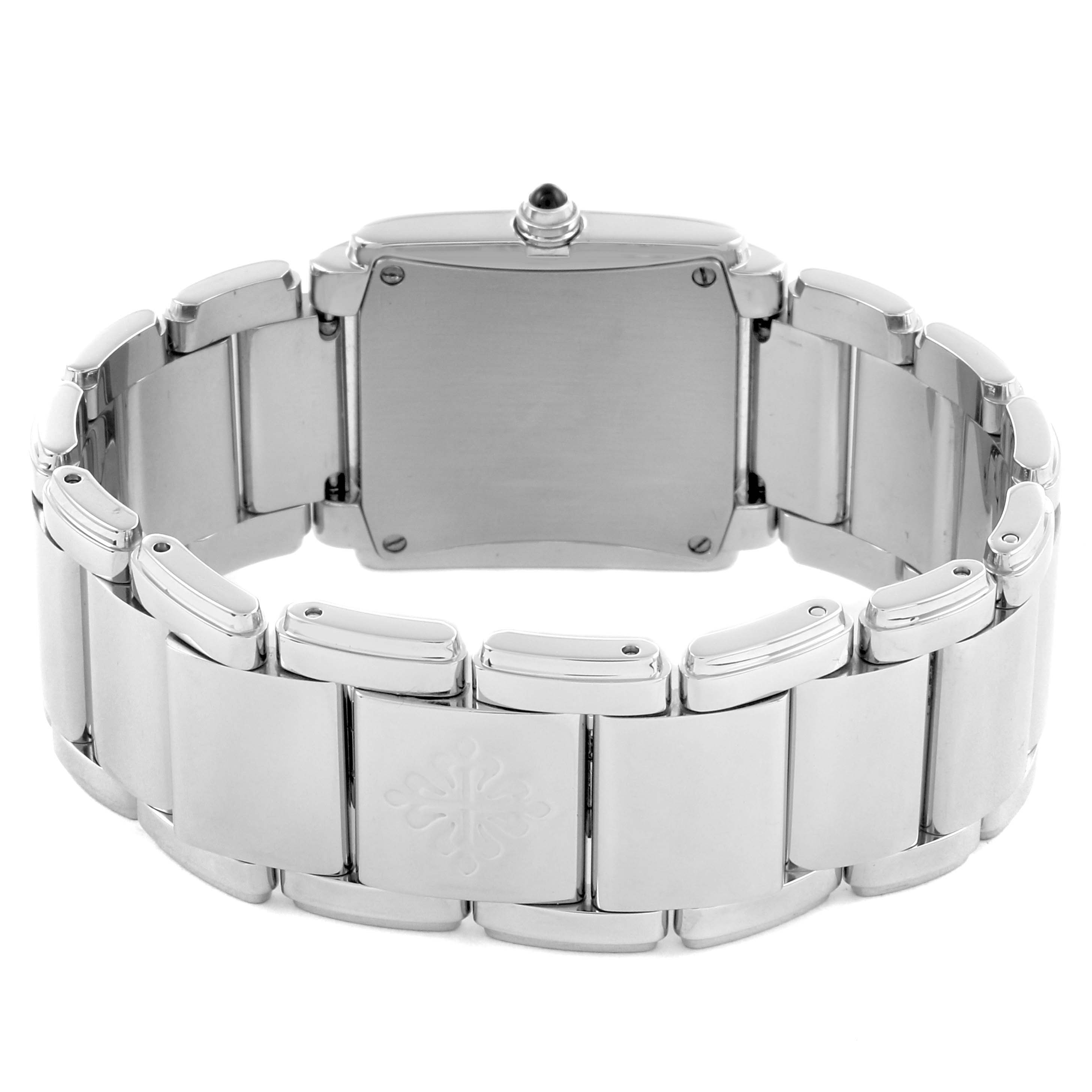 The image shows a rear view of a Patek Philippe Twenty-4 4910/10A-001 Women's Stainless Steel Black Dial 4910/10A-001 Women's Stainless Steel Black Dial watch, highlighting the bracelet and case back.