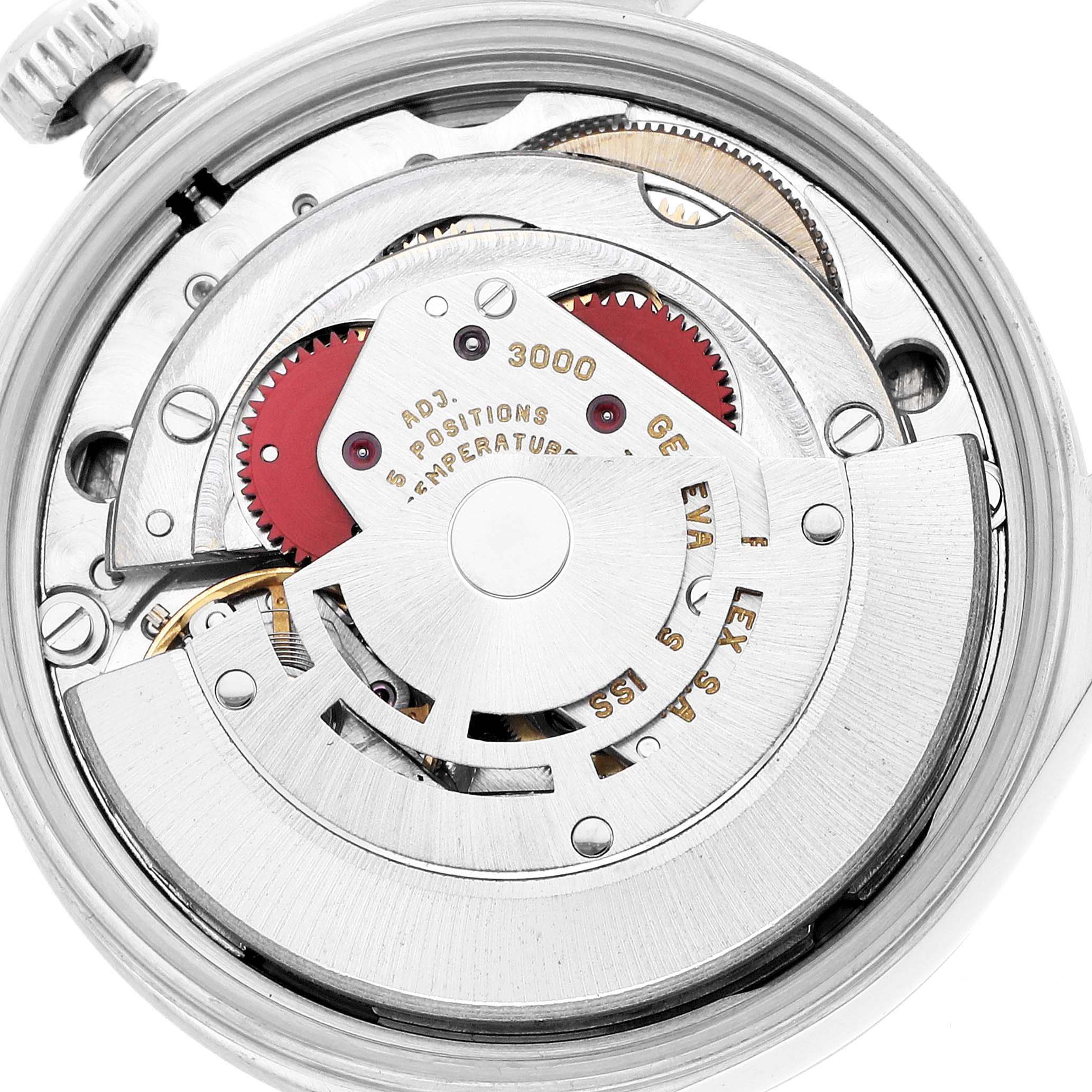 The image shows the movement of the Rolex Oyster Perpetual 14000 Men's Stainless Steel Black Dial, viewed from the back, highlighting gears and rotor.