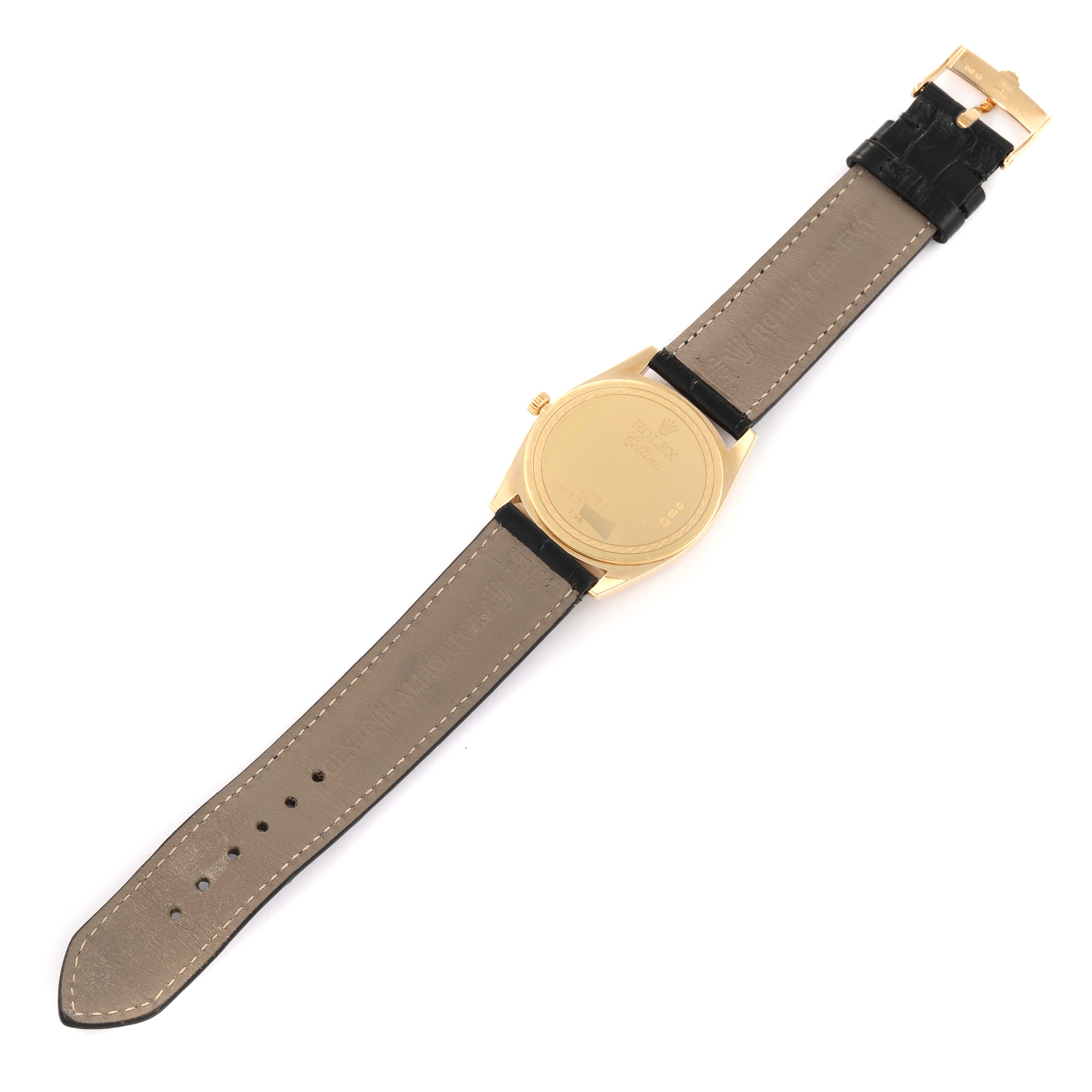 This image shows the back view of a Rolex Cellini 4233 Men's Yellow Gold Black Dial 4233 Men's Yellow Gold Black Dial watch, including the case back, leather strap, and buckle.