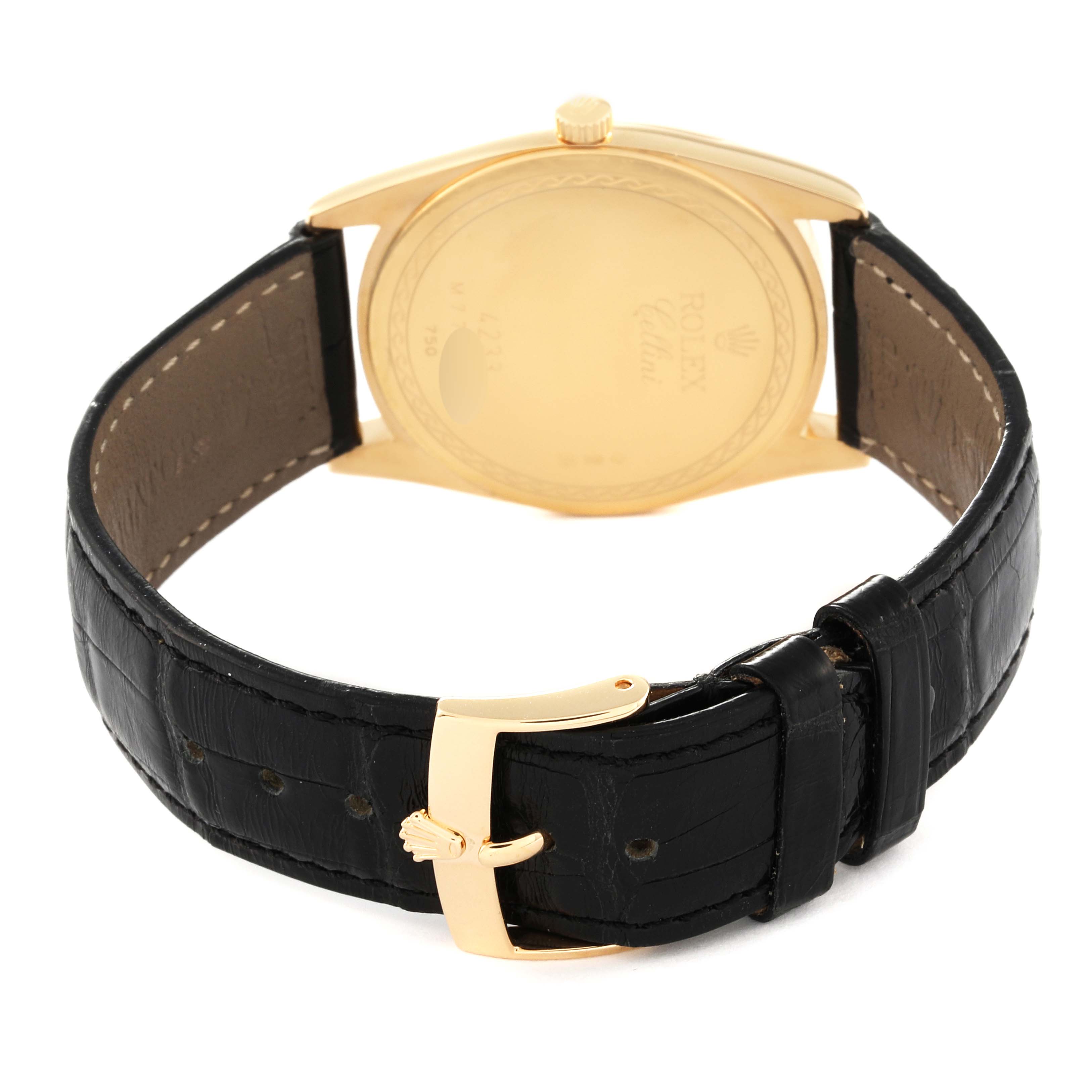 This image shows the back case of the Rolex Cellini 4233 Men's Yellow Gold Black Dial 4233 Men's Yellow Gold Black Dial watch and its black leather strap with a gold buckle.