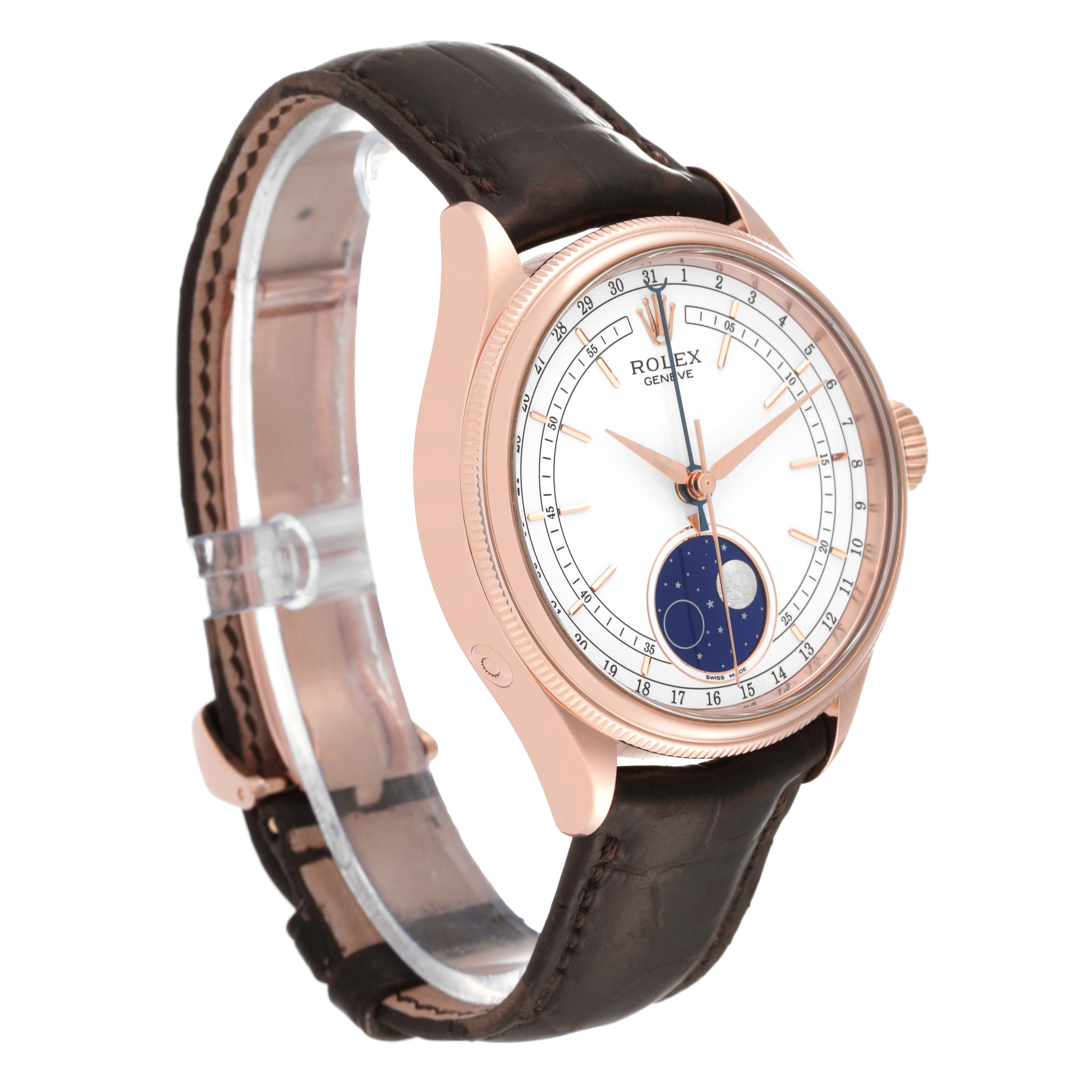 The Rolex Cellini 50535 Men's Rose Gold White Dial 50535 Men's Rose Gold White Dial watch is shown at an oblique angle, displaying its dial, case, crown, and leather strap.