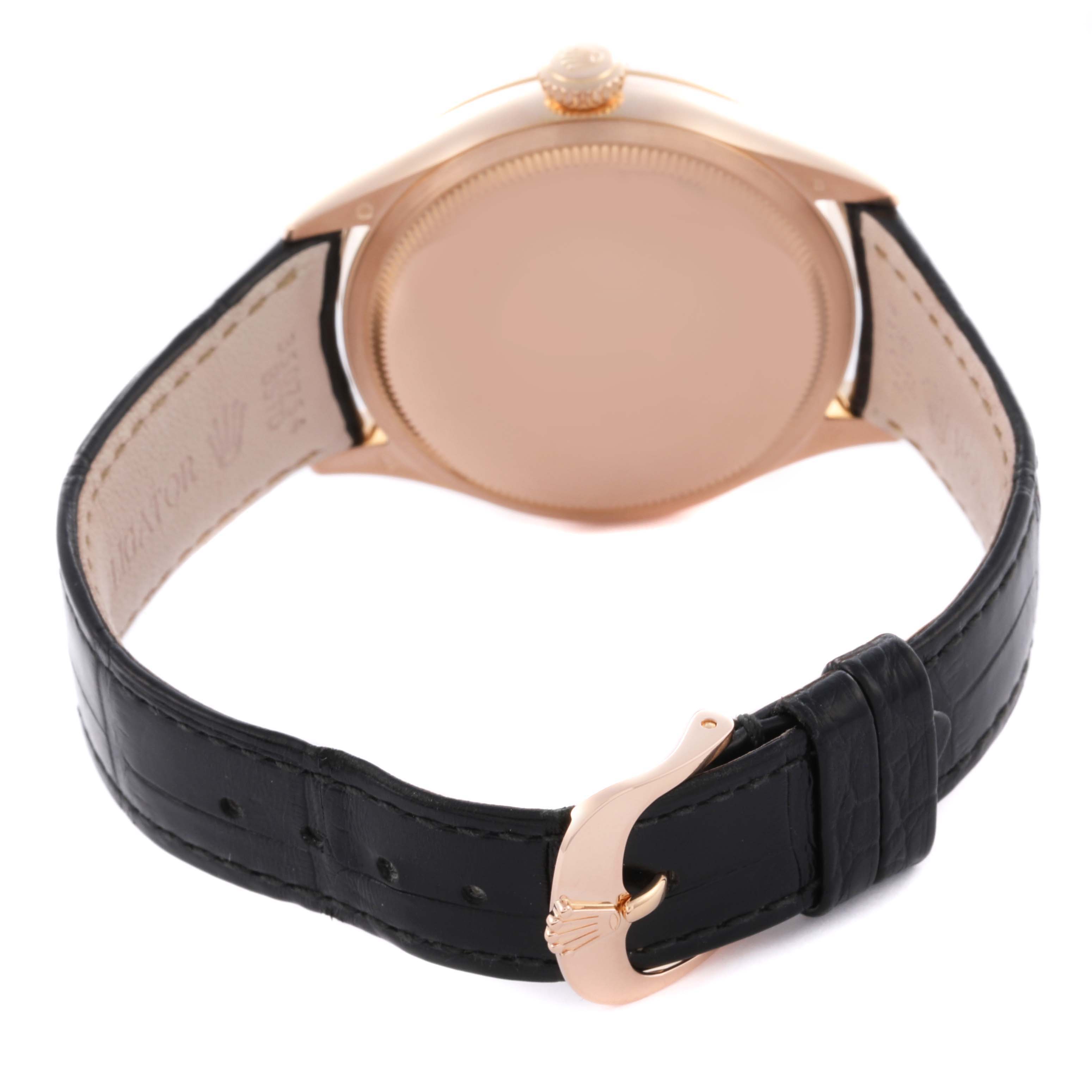 The image shows the back and side of the Rolex Cellini 50505 Men's Rose Gold Pink Dial 50505 Men's Rose Gold Pink Dial watch, highlighting its clasp and leather strap.