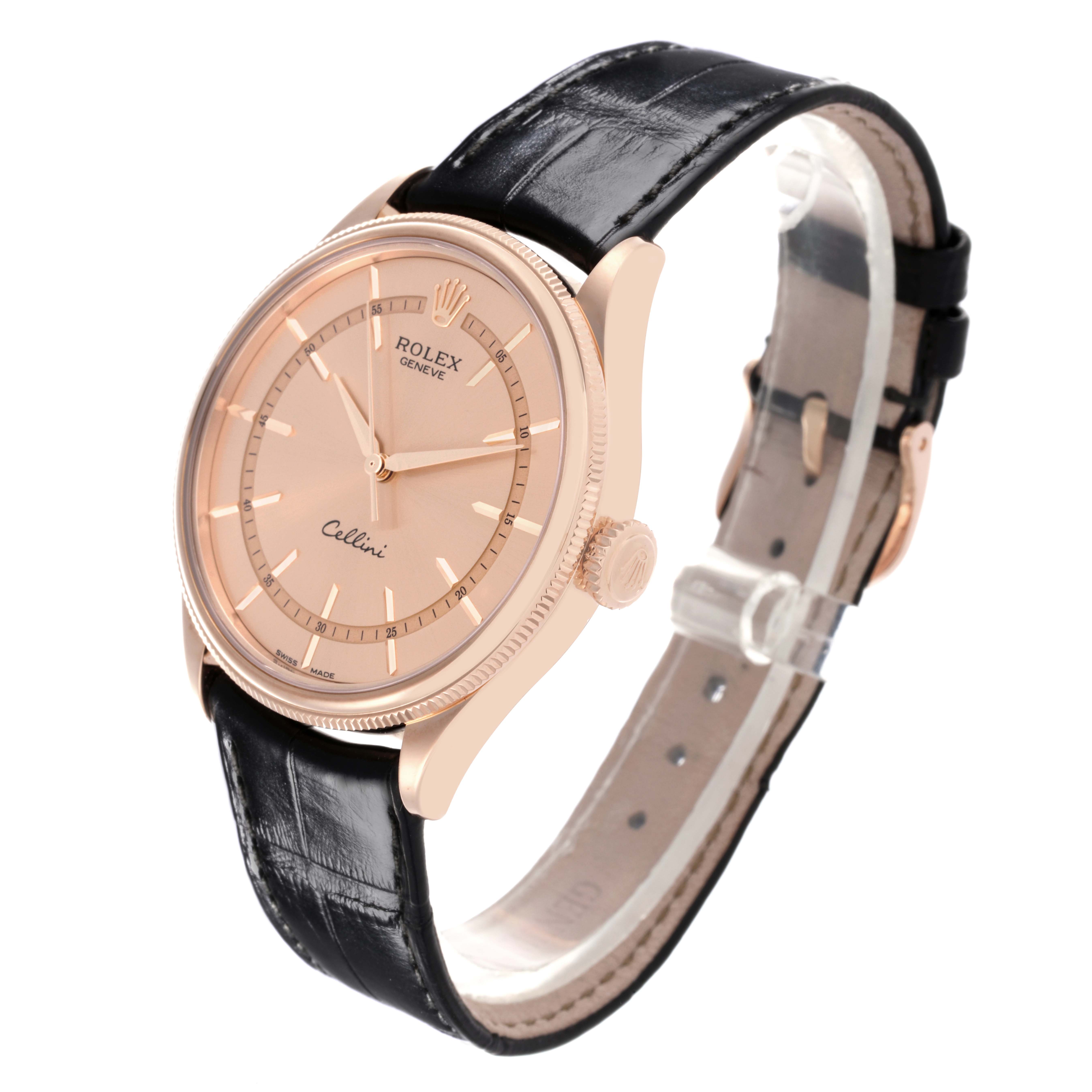 The Rolex Cellini 50505 Men's Rose Gold Pink Dial 50505 Men's Rose Gold Pink Dial watch is shown in a three-quarter view, highlighting the dial, case, crown, and leather strap.