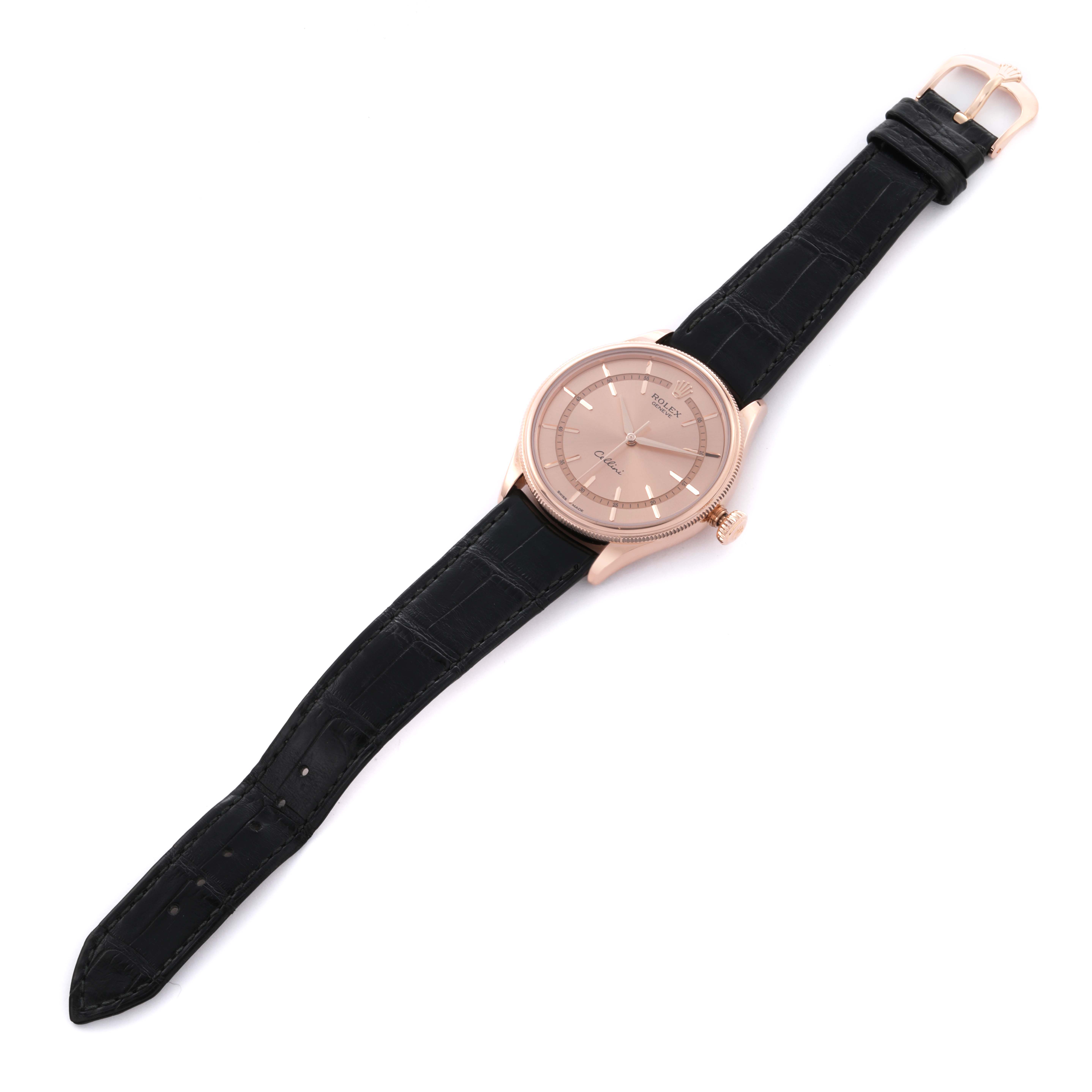 The Rolex Cellini 50505 Men's Rose Gold Pink Dial 50505 Men's Rose Gold Pink Dial watch is shown at a top-down angle with its full face, strap, and buckle visible.