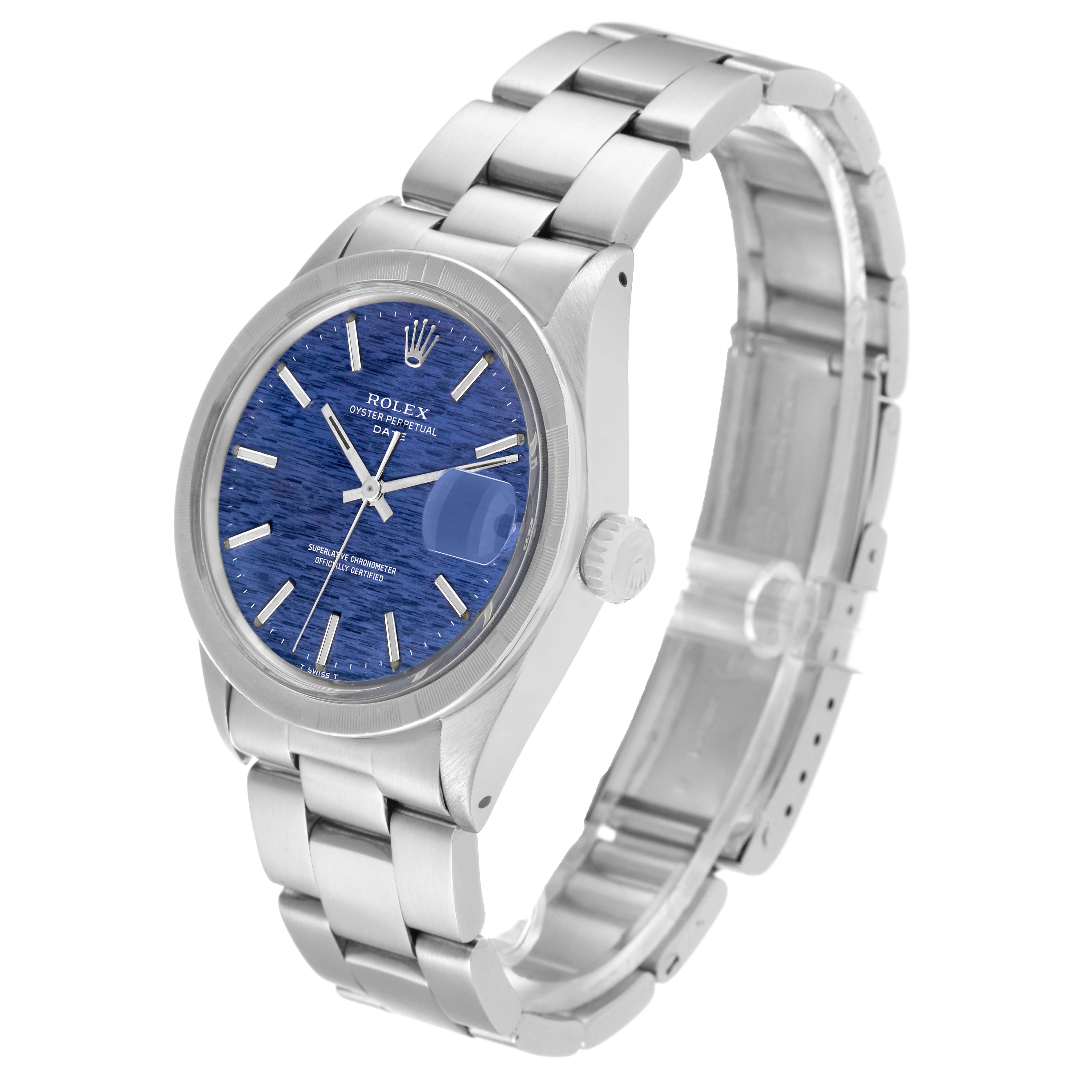 The image shows a Vintage Collection Rolex watch at a slight side angle highlighting the blue dial and stainless steel bracelet.