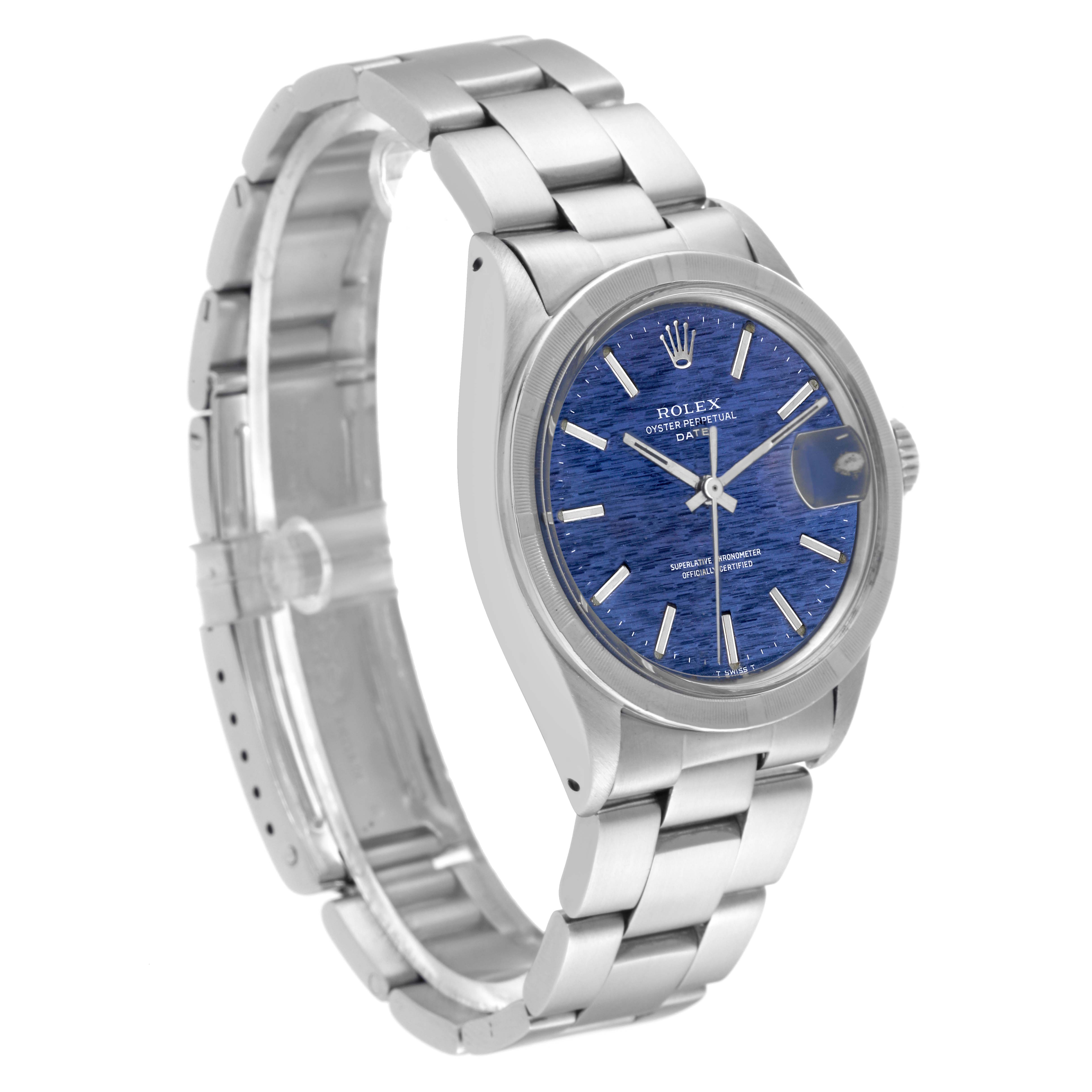 The image shows a left-side angled view of a Vintage Collection model by Rolex, highlighting its bracelet, case, and blue dial.
