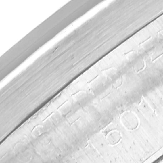 This close-up image shows the engraved inner rim of the Rolex Vintage Collection 1501 Men's Stainless Steel Blue Dial 1501 Men's Stainless Steel Blue Dial watch case.