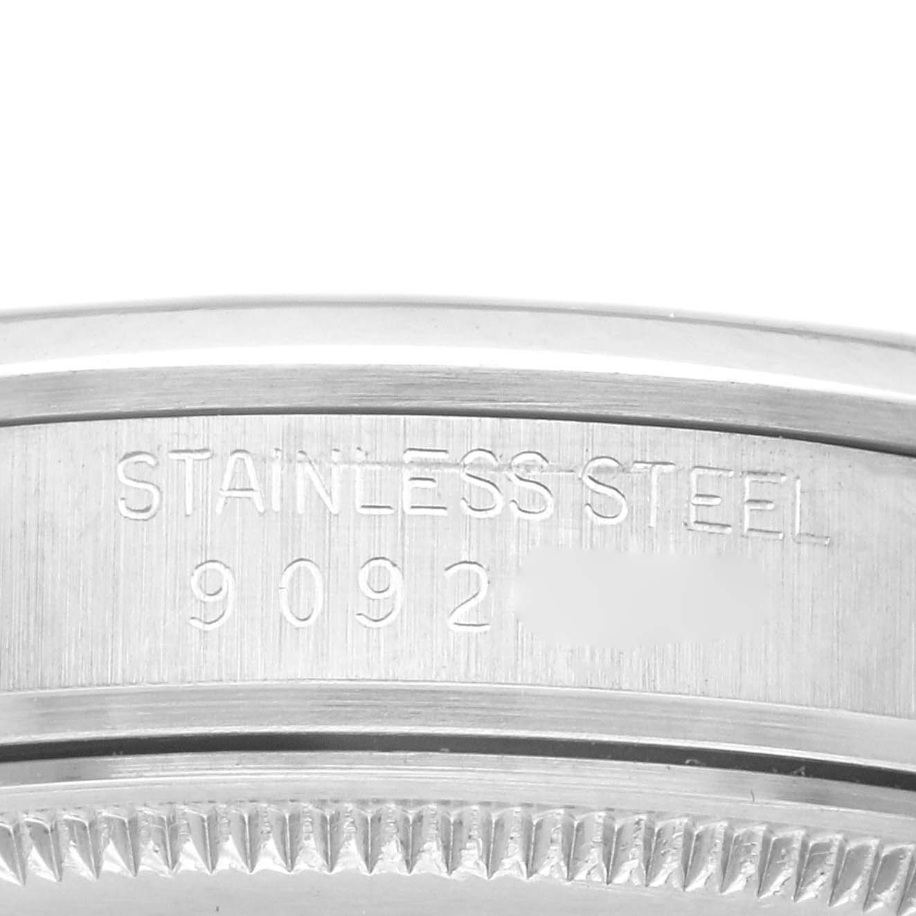 The image shows the side of the Rolex Vintage Collection 15000 Men's Stainless Steel Silver Dial 15000 Men's Stainless Steel Silver Dial watch case with engravings, including "STAINLESS STEEL" and a model number.