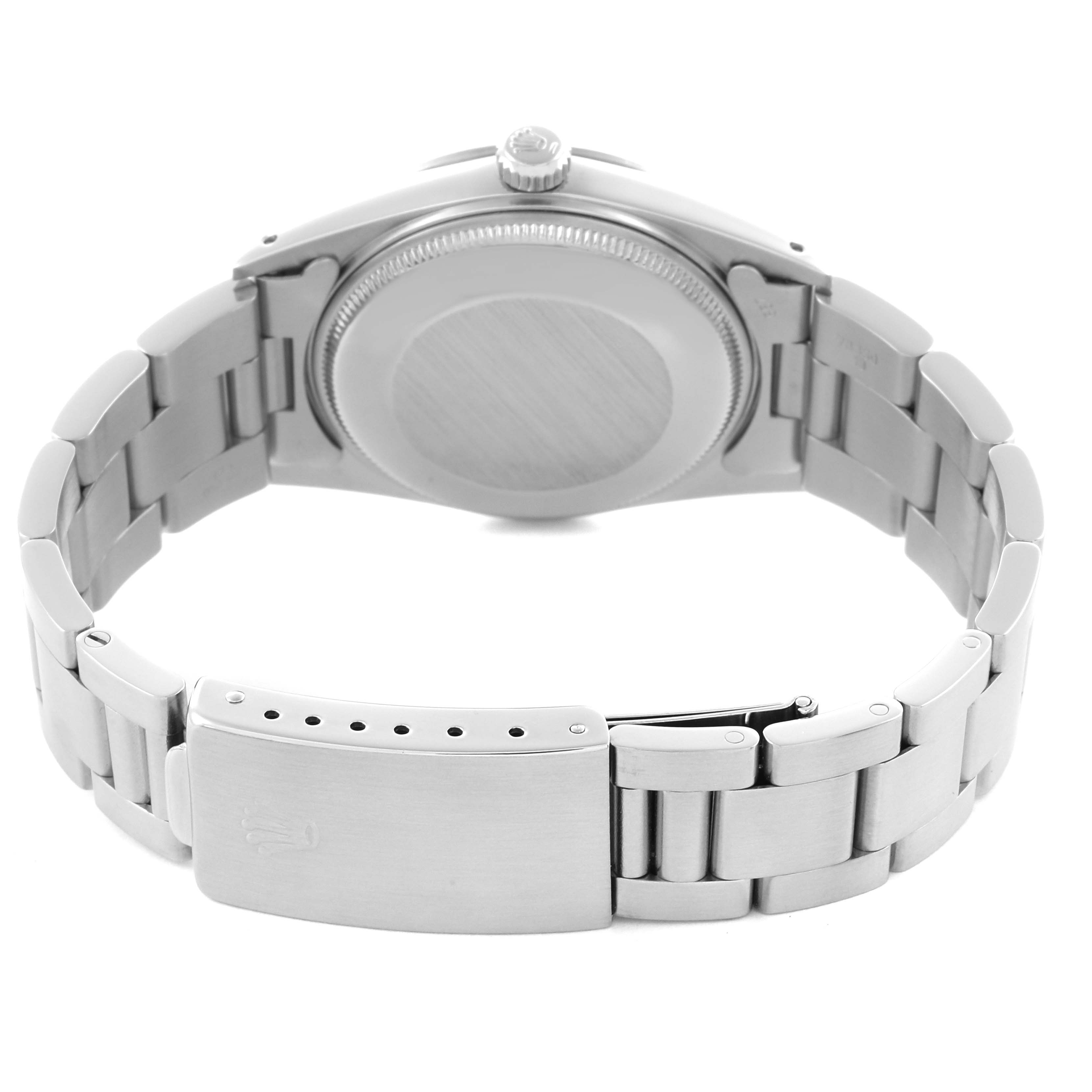 The image shows the back case and bracelet clasp of a Rolex Vintage Collection 15000 Men's Stainless Steel Silver Dial 15000 Men's Stainless Steel Silver Dial watch.