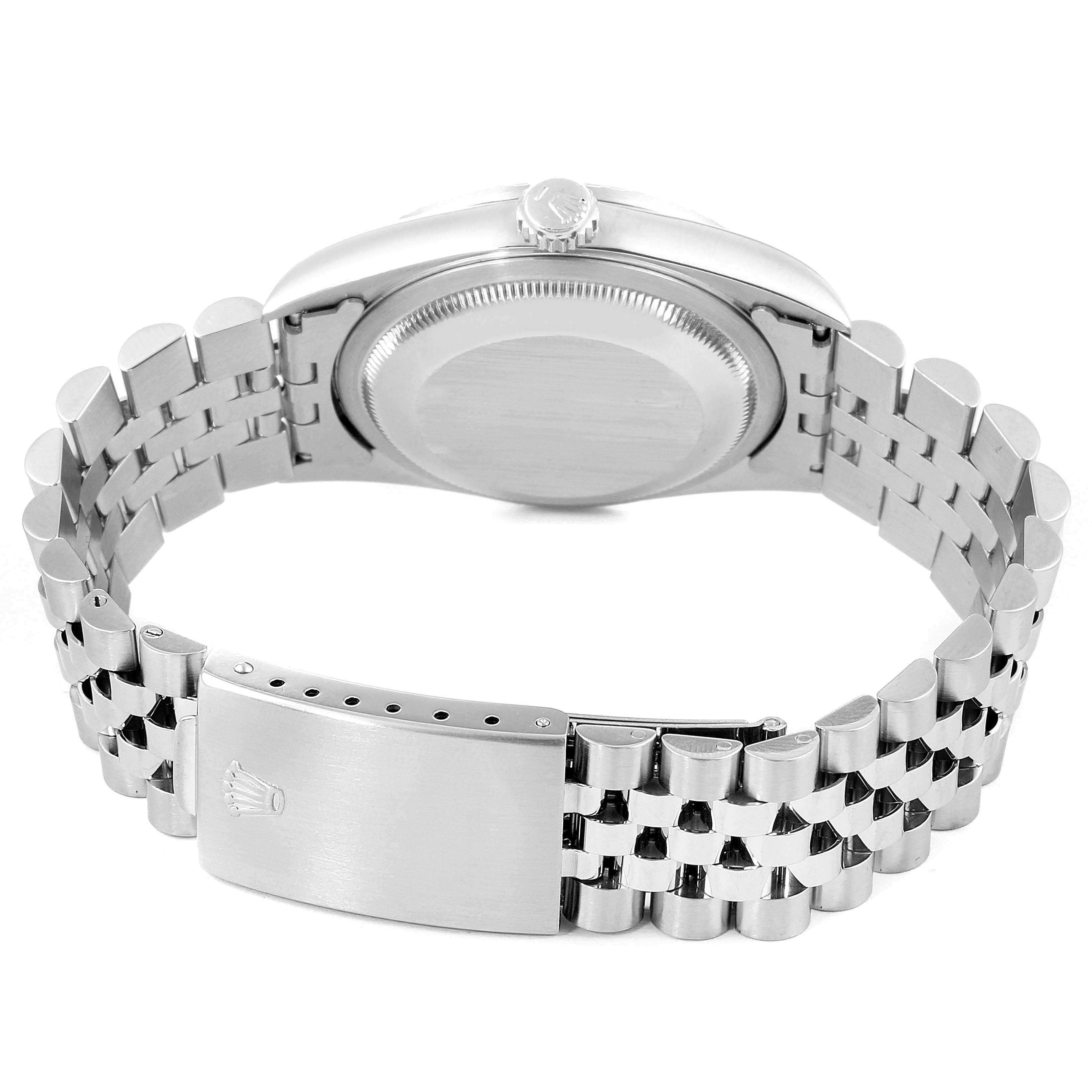 The image shows the back view of a Rolex Datejust 16220 Men's Stainless Steel Pink Dial 16220 Men's Stainless Steel Pink Dial watch, highlighting its caseback and Jubilee bracelet with a closed clasp.