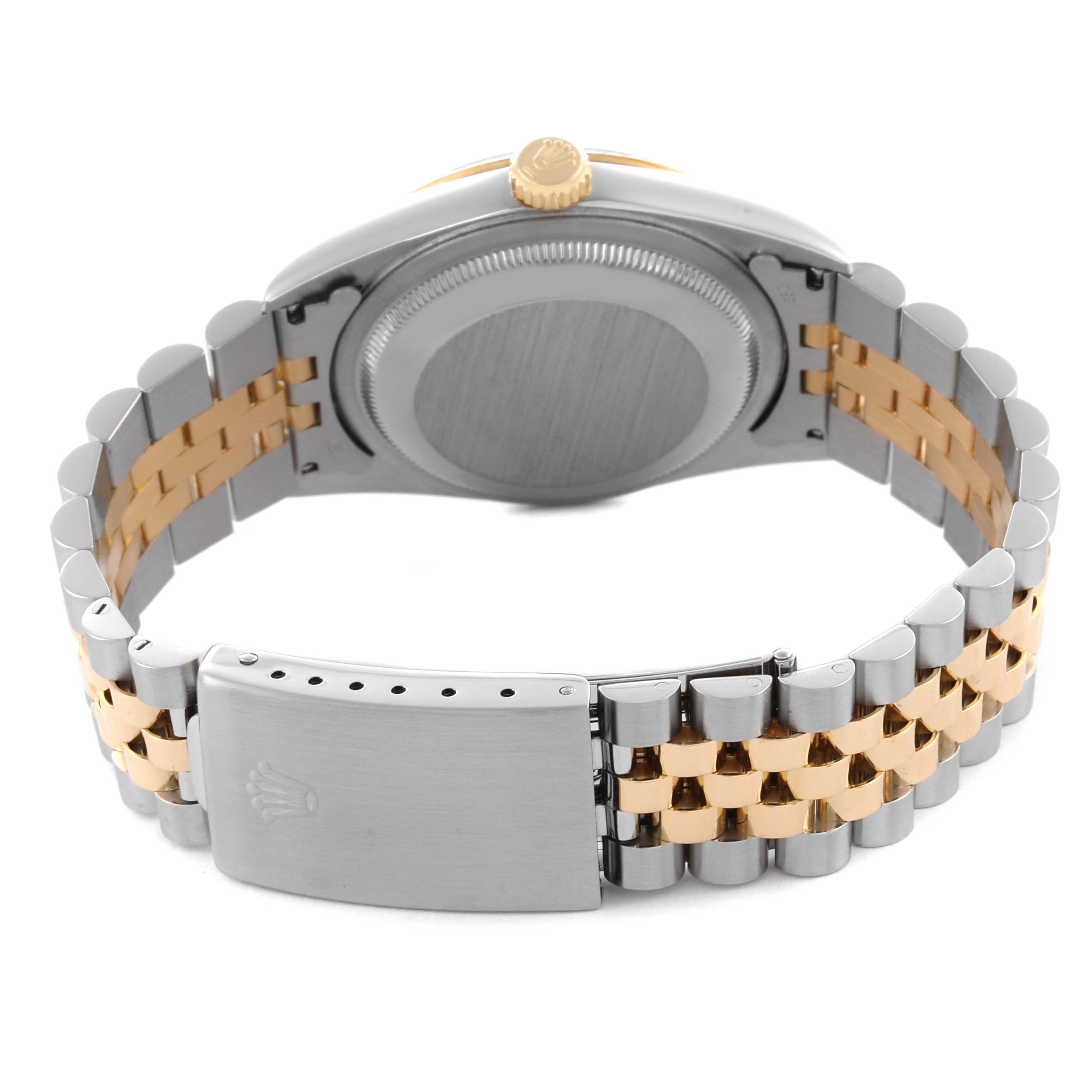 The image shows the back view of a Rolex Datejust 16233 Men's Steel and Gold (two tone) Black Dial 16233 Men's Steel and Gold (two tone) Black Dial with its Jubilee bracelet and clasp.