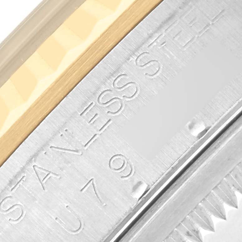 The image shows a close-up of the bezel and case side, highlighting "STAINLESS STEEL" on a Rolex Datejust 16233 Men's Steel and Gold (two tone) Black Dial 16233 Men's Steel and Gold (two tone) Black Dial watch.