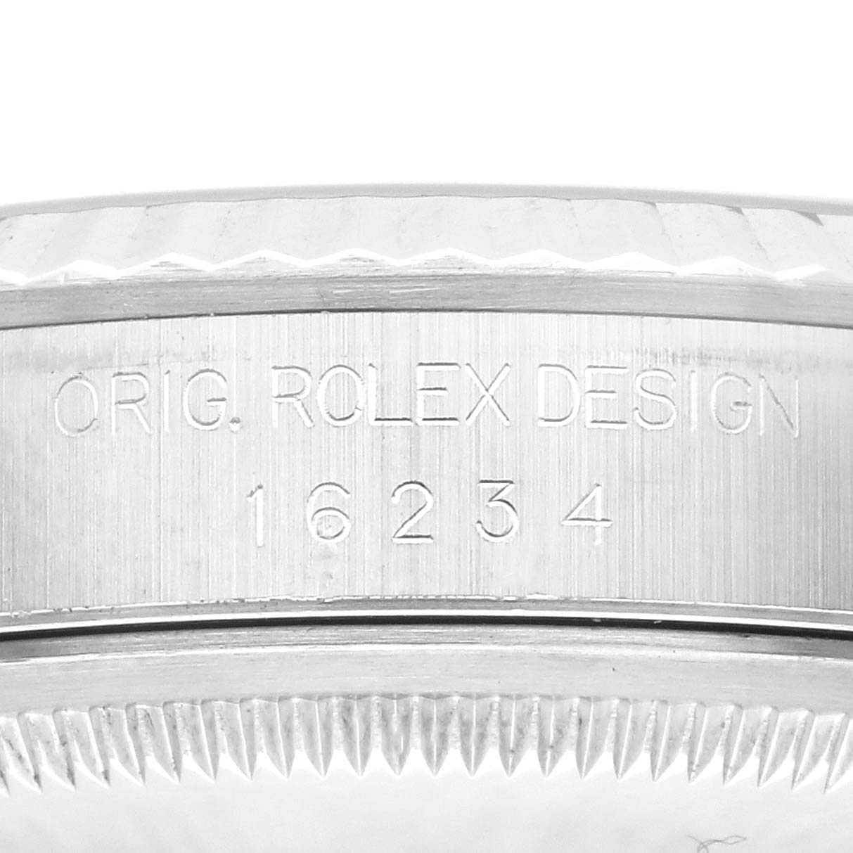 The image shows a close-up of the side engraving on a Rolex Datejust 16234 Men's Stainless Steel Black Dial 16234 Men's Stainless Steel Black Dial, displaying the model number.