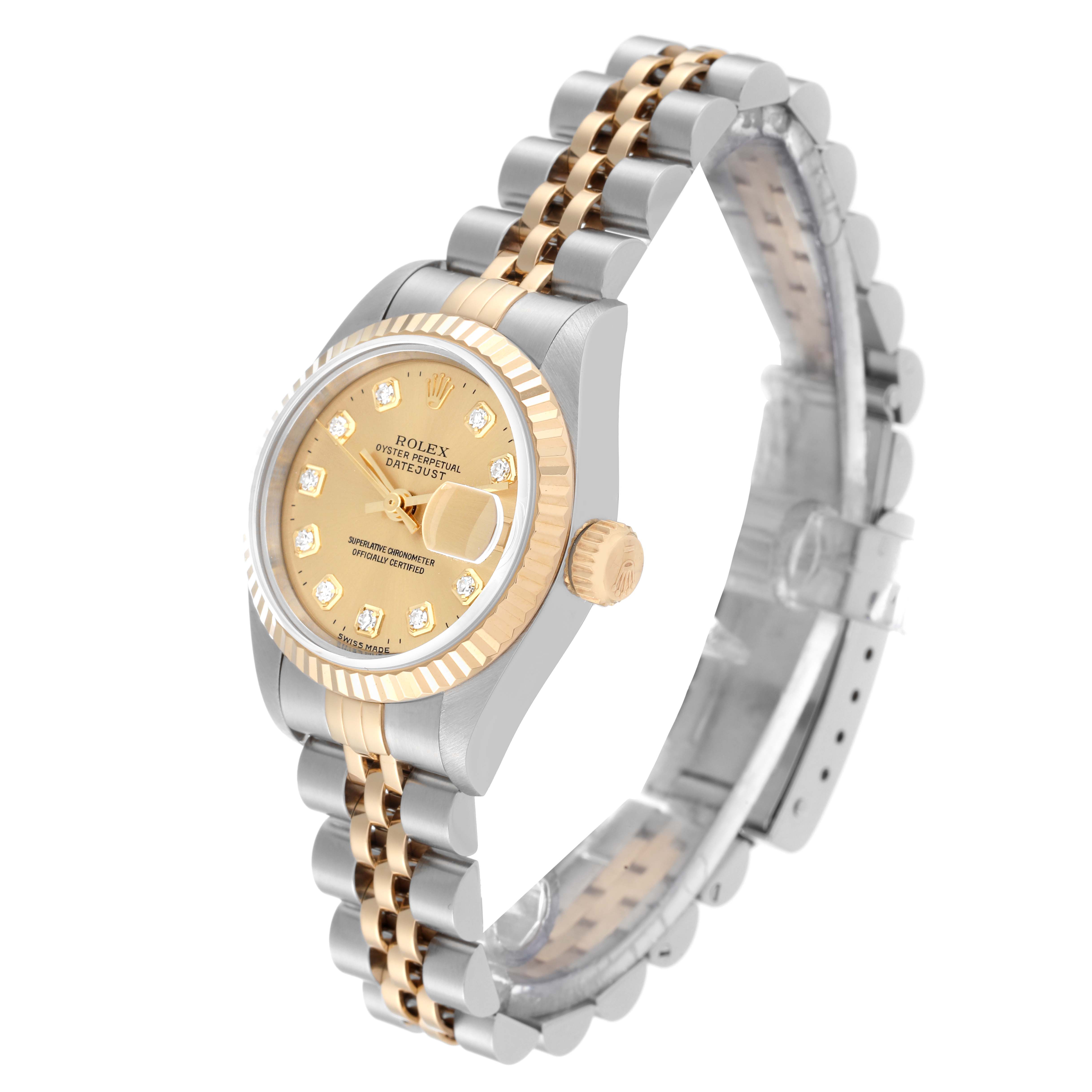 The Rolex Datejust 69173 Women's Steel and Gold (two tone) Champagne Dial 69173 Women's Steel and Gold (two tone) Champagne Dial watch is shown at a three-quarter angle, highlighting its champagne dial, fluted bezel, and two-tone bracelet.
