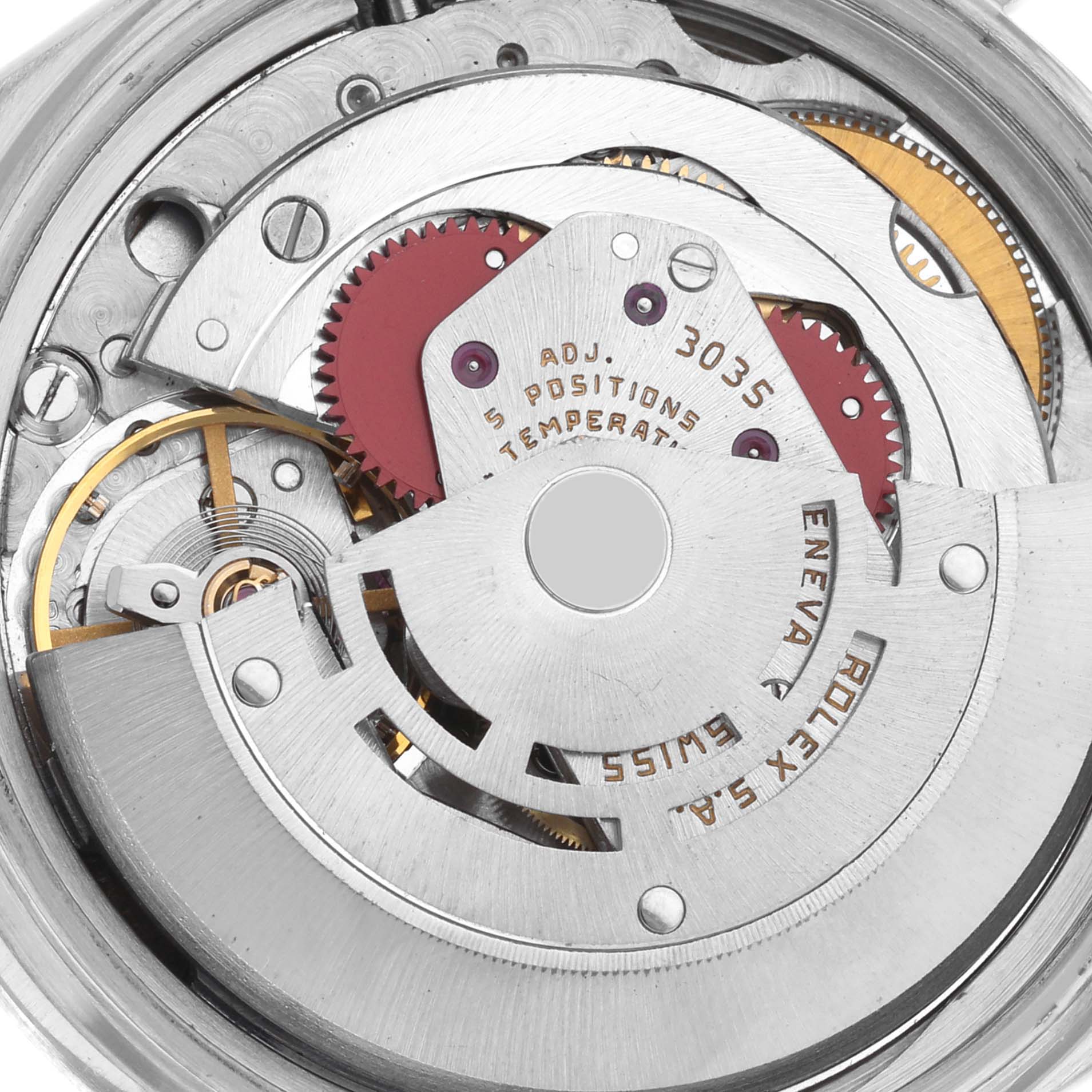 The image shows a close-up of the Rolex Vintage Collection 16030 Men's Stainless Steel Silver Dial 16030 Men's Stainless Steel Silver Dial watch movement, highlighting gears and mechanical parts from a top-down angle.