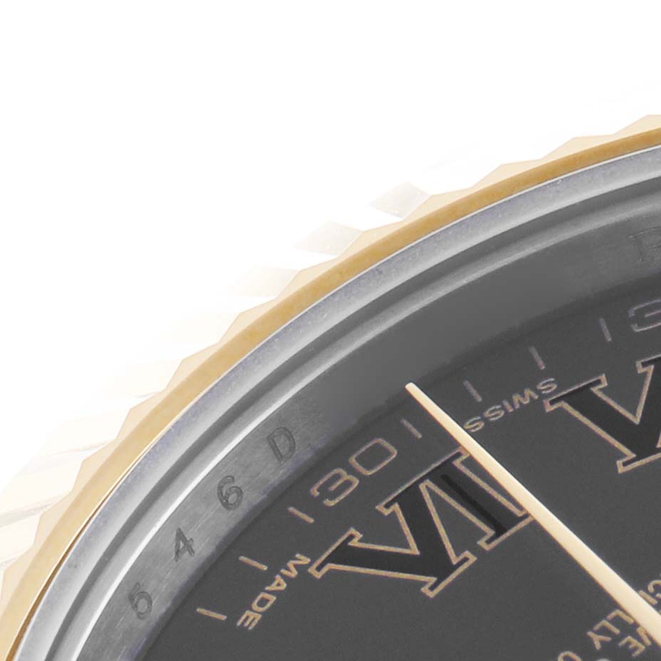 The image shows a close-up of the Datejust 41 by Rolex, highlighting the bezel and part of the dial with Roman numerals.