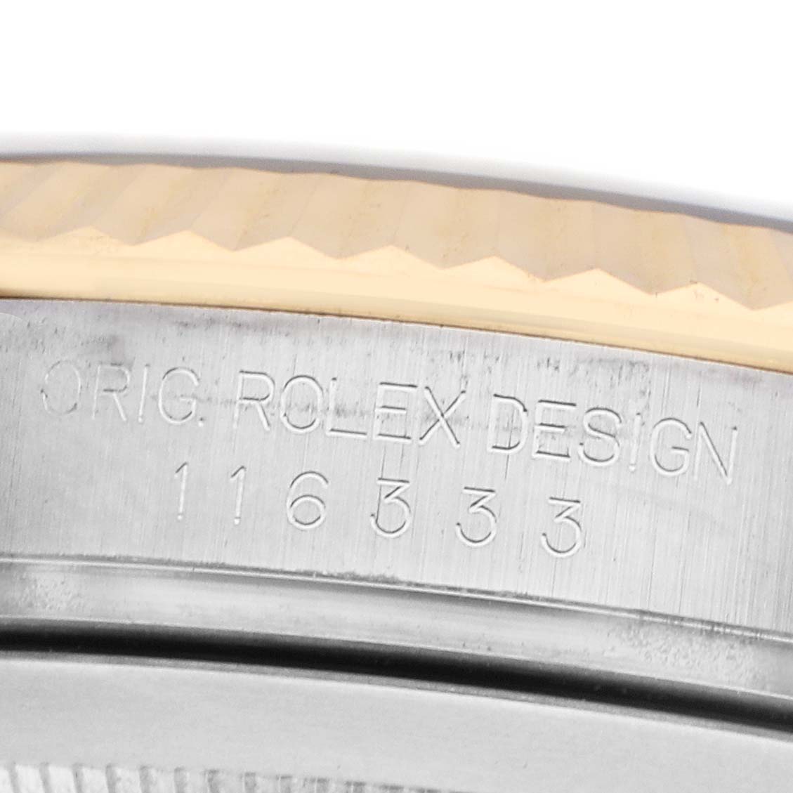 The image shows an engraving on the side of the case of a Rolex Datejust 41 116333 Men's Steel and Gold (two tone) Black Dial, displaying the model and design numbers.