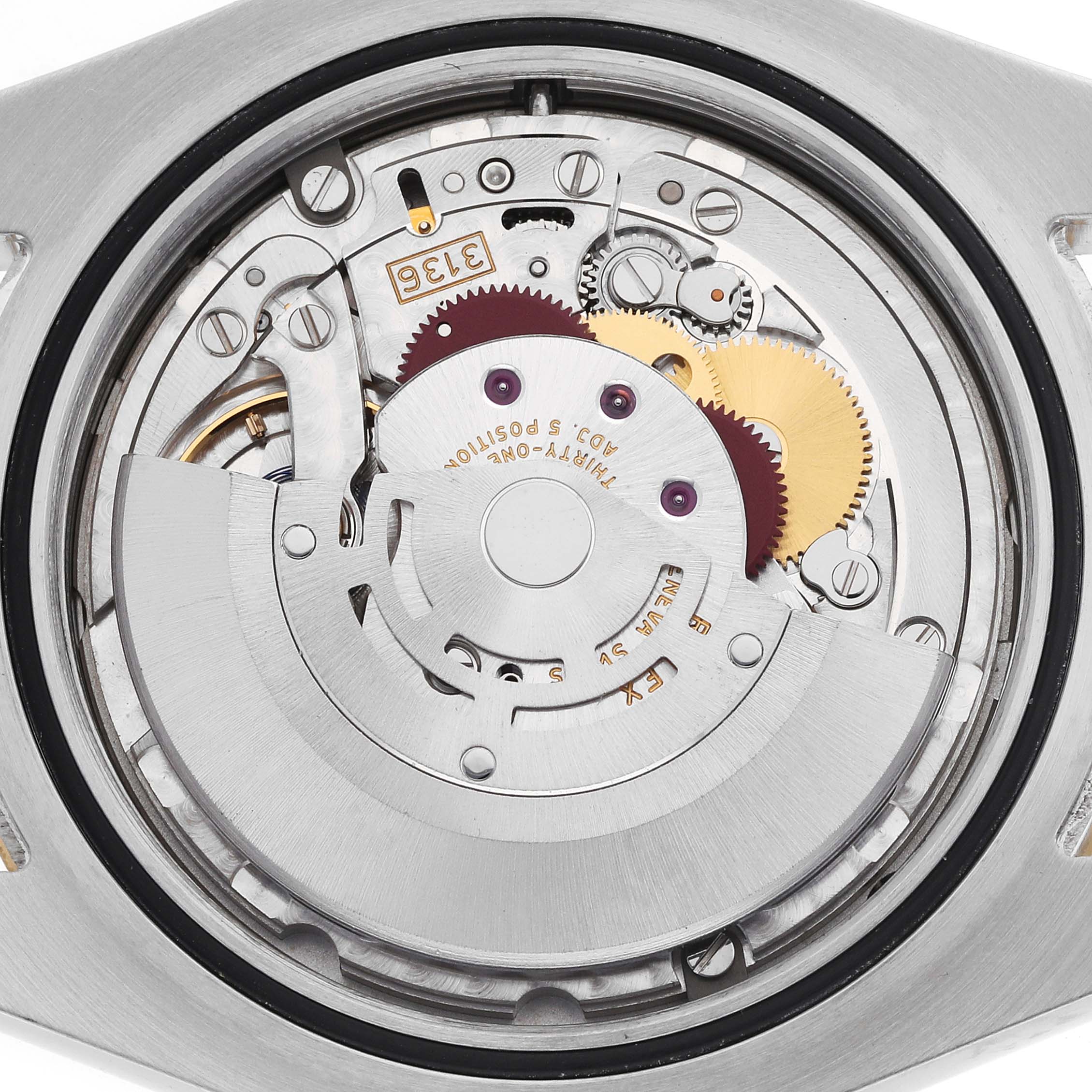The image shows the movement mechanism of a Rolex Datejust 41 116333 Men's Steel and Gold (two tone) Black Dial from a back view, highlighting gears and components.