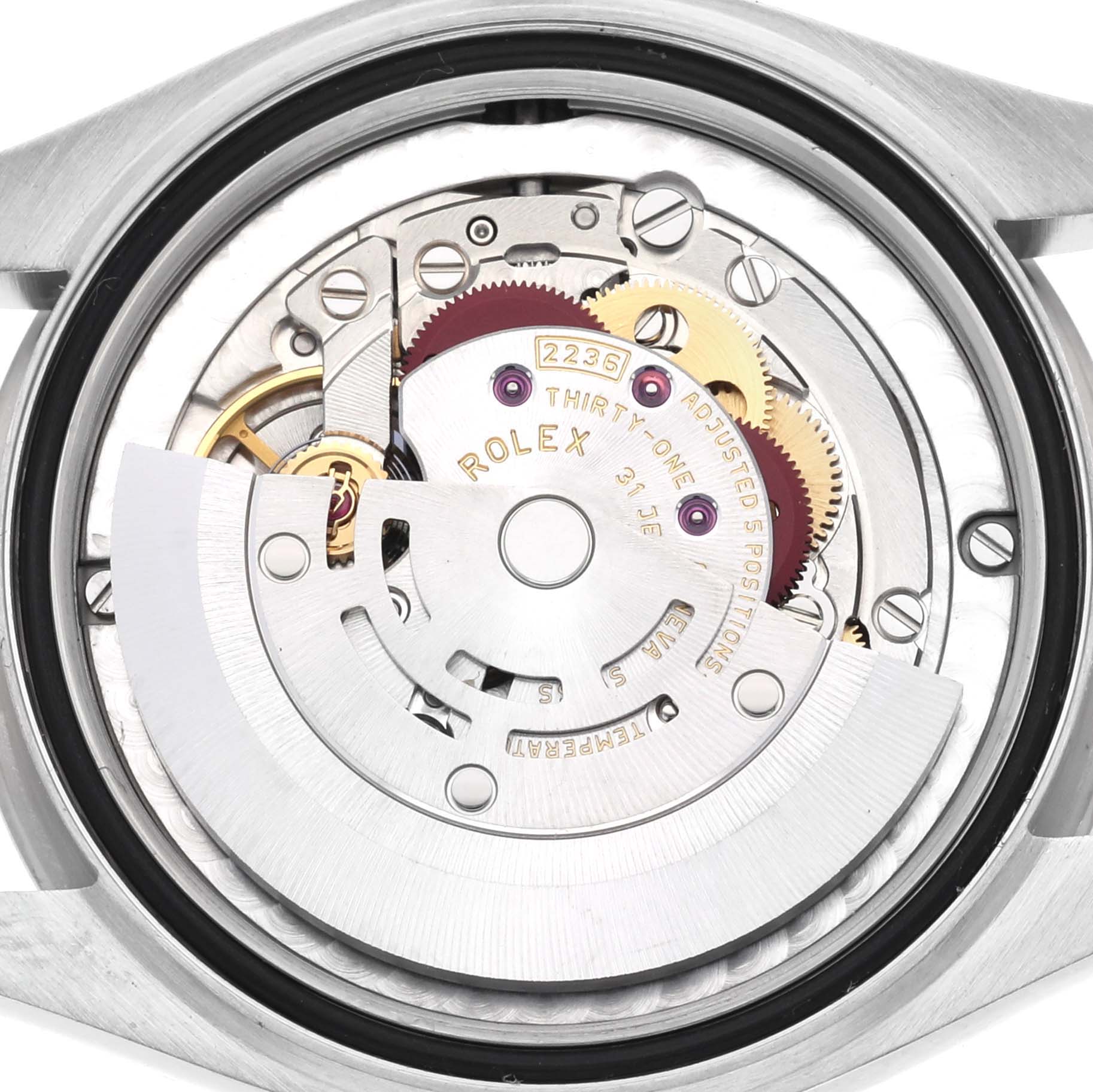 The image shows the back view of the Rolex Mid-Size 278384 Women's Stainless Steel Silver Dial 278384 Women's Stainless Steel Silver Dial watch, highlighting its intricate movement parts.