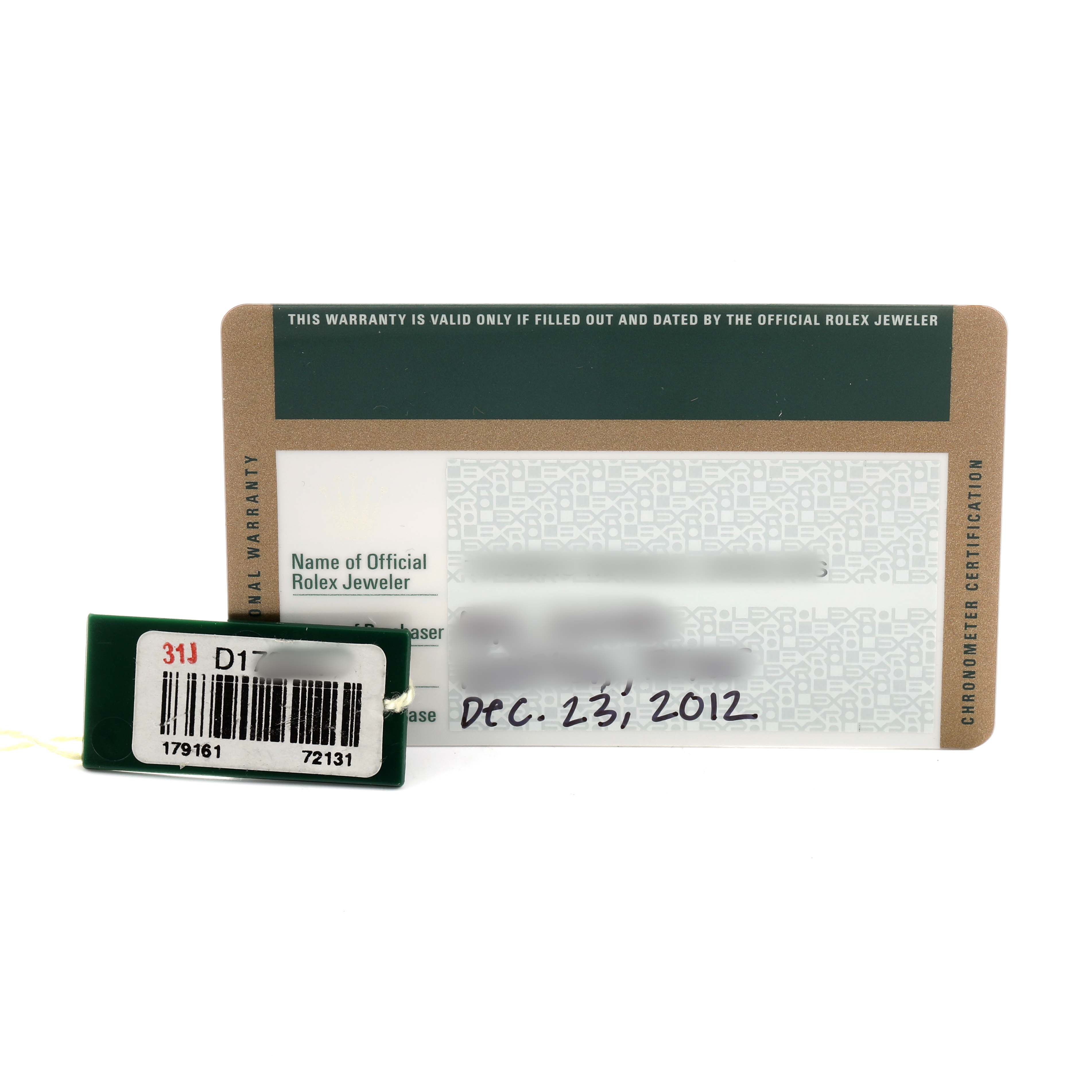 The image shows a Rolex Datejust 179161 Women's Rose Gold Blue Dial warranty card and a green tag with barcodes, viewed from the front.