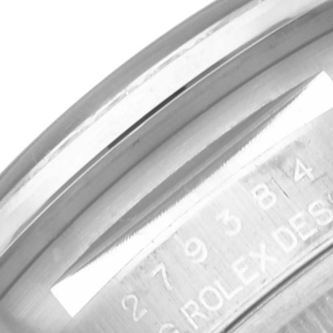 This is a close-up angle showing the side engraving on the bezel of a Rolex Datejust 279384RBR Women's Stainless Steel Silver Dial 279384RBR Women's Stainless Steel Silver Dial watch.