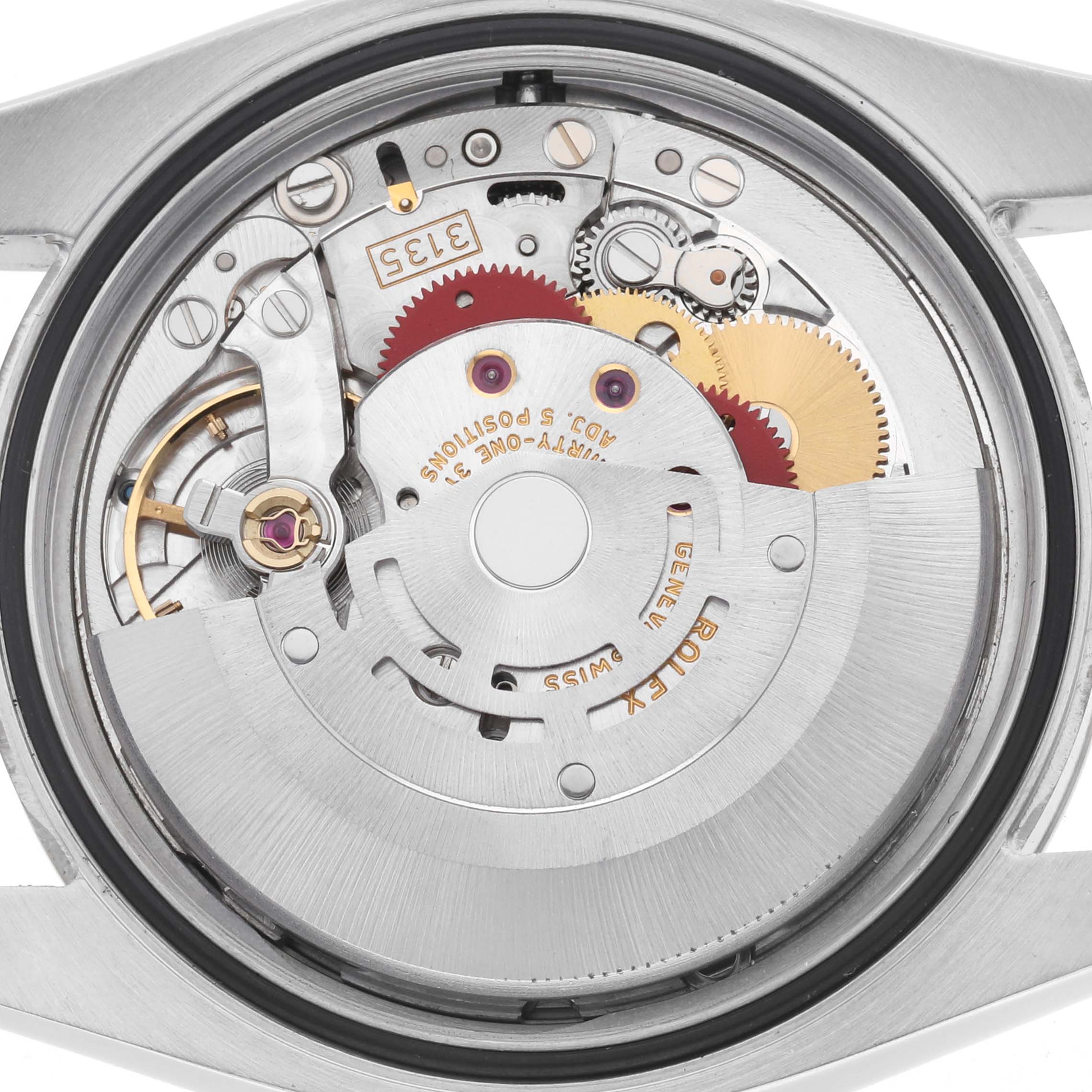 The image shows the movement mechanism of a Rolex Datejust 116233 Men's Stainless Steel Grey Dial watch from a top-down view, highlighting gears and components.