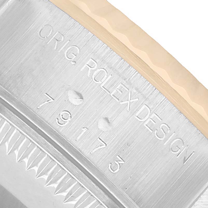 The image shows the side engraving on the bezel of a Rolex Datejust 79173 Women's Stainless Steel White Dial, including the model number.