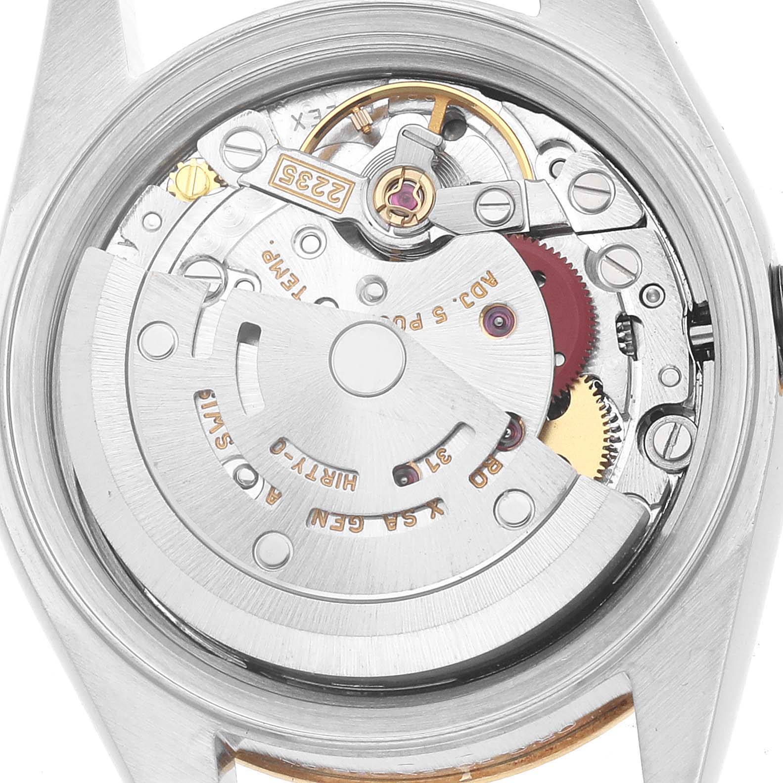 The image shows the movement of a Rolex Datejust 79173 Women's Stainless Steel White Dial, focusing on its intricate components and rotor from the back.