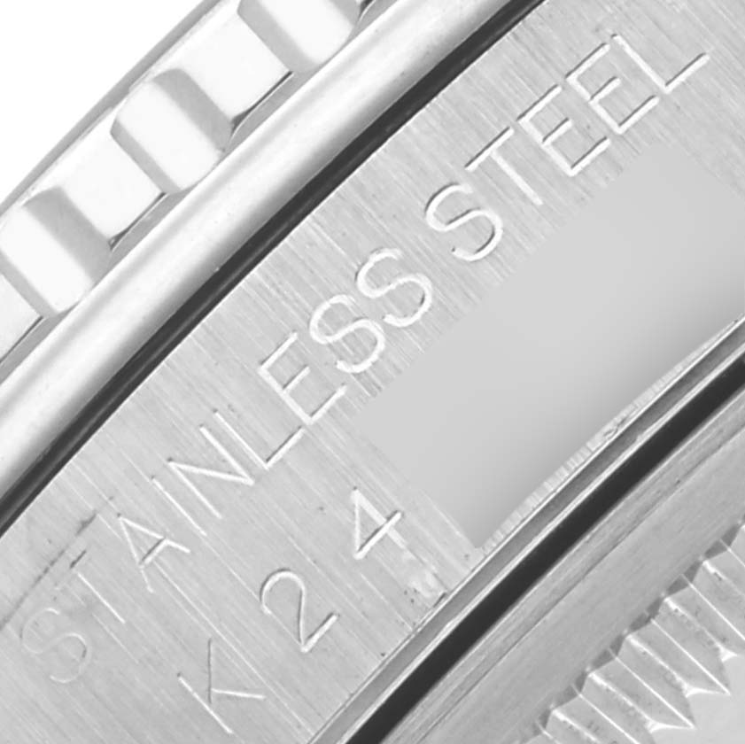 The image shows a close-up of the engraved case side of a Rolex Turn-o-Graph 16264 Men's Stainless Steel Silver Dial 16264 Men's Stainless Steel Silver Dial watch, highlighting "STAINLESS STEEL."