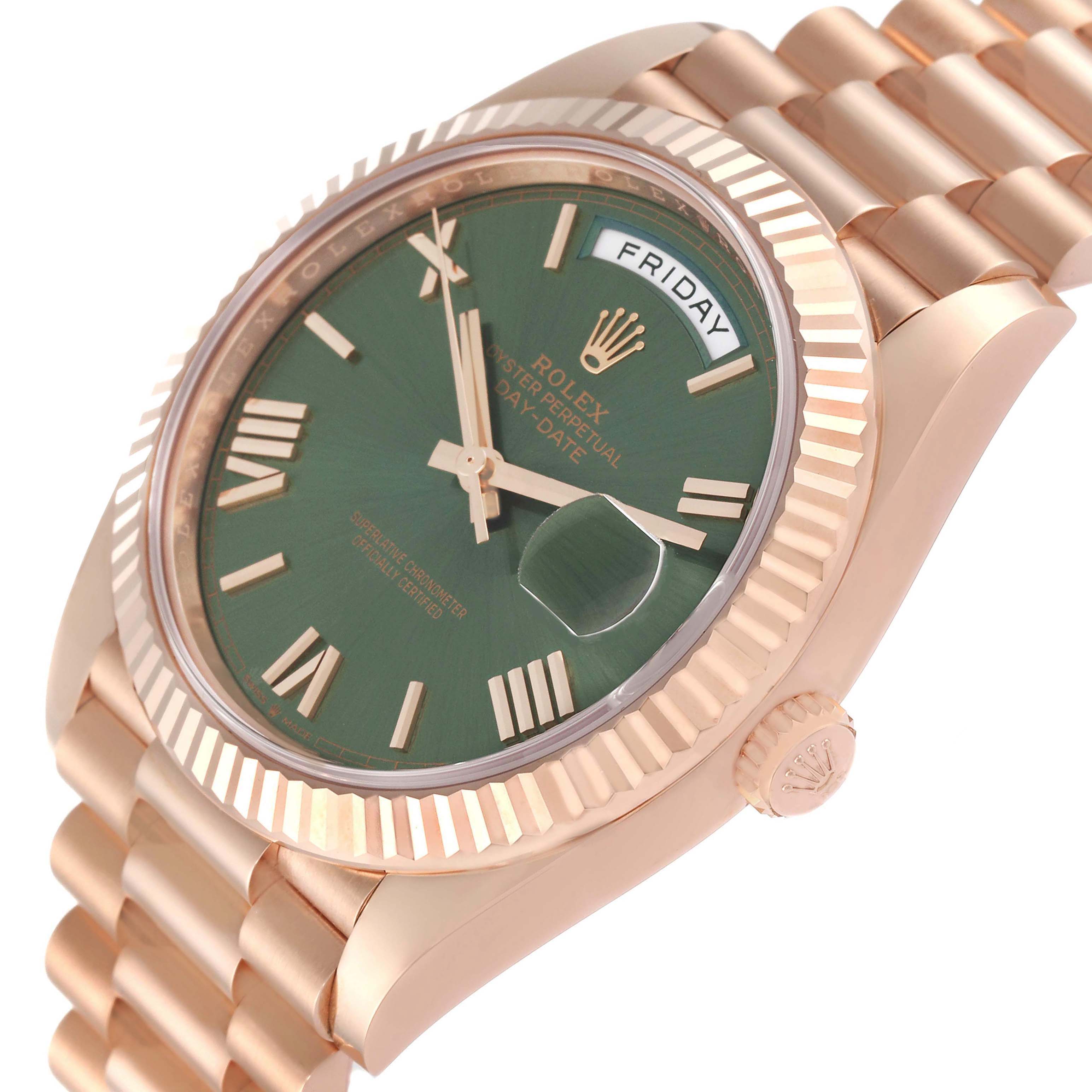 The Rolex President 228235 Men's Rose Gold Green Dial watch is shown from a front-side angle, highlighting the green dial, fluted bezel, day window, and bracelet.