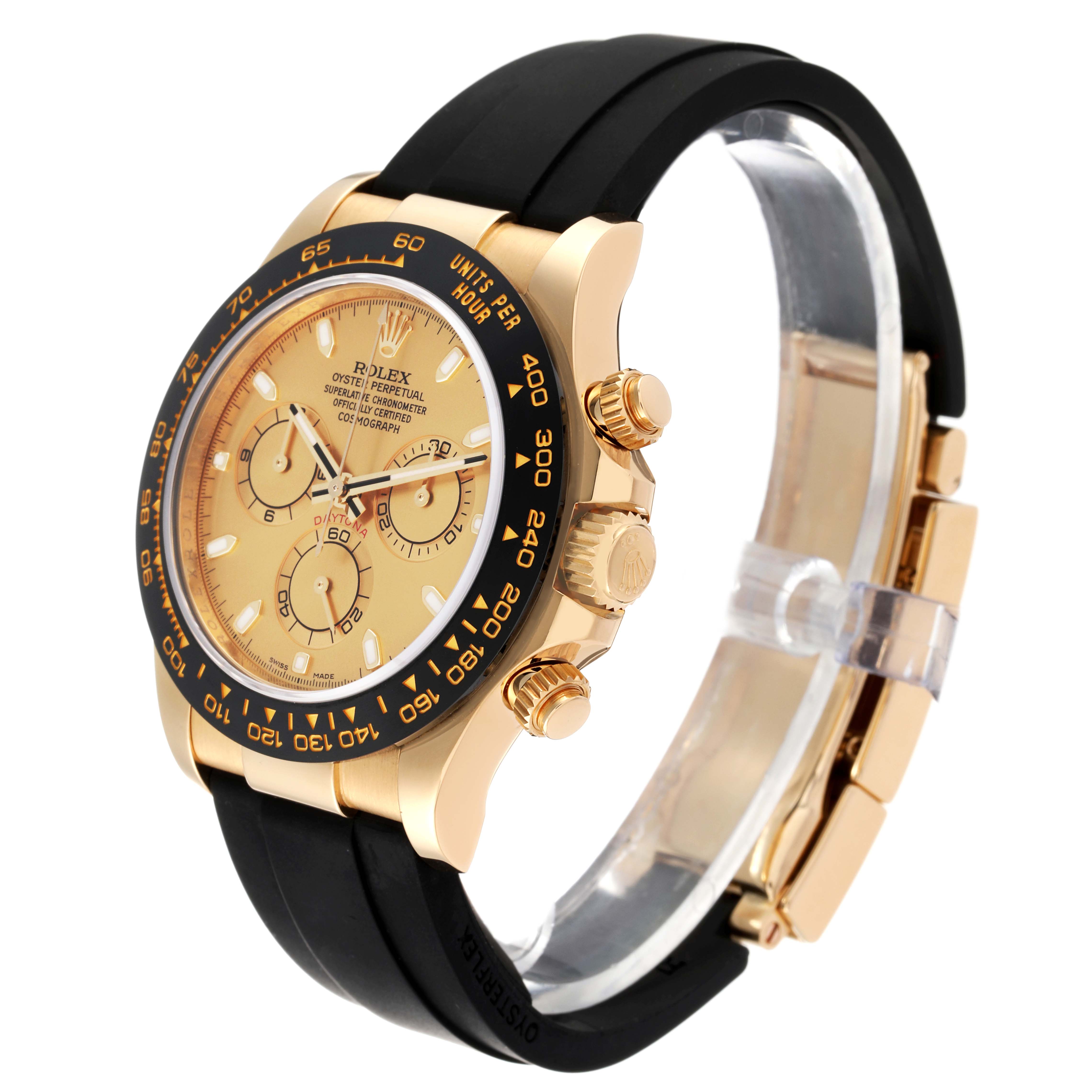 The Rolex Daytona 116518LN Men's Yellow Gold Champagne Dial 116518LN Men's Yellow Gold Champagne Dial watch is shown from a side angle, highlighting its dial, bezel, pushers, and rubber strap.