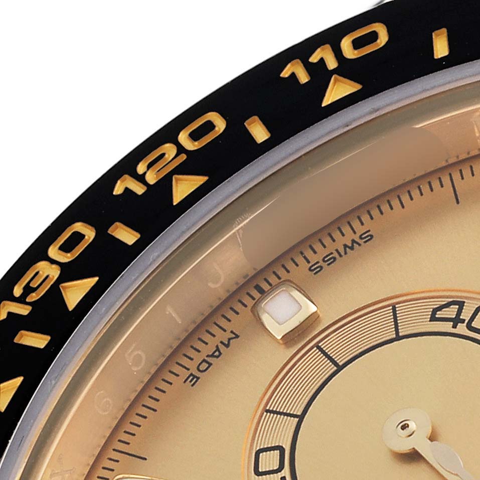 This close-up image shows the bezel and partial dial of the Rolex Daytona 116518LN Men's Yellow Gold Champagne Dial 116518LN Men's Yellow Gold Champagne Dial watch.