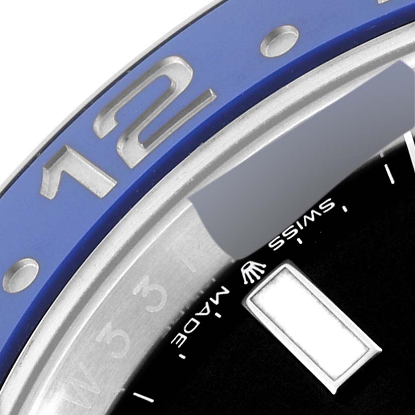 The image shows a close-up of the bezel and dial edge of a Rolex GMT-Master 126710BLNR Men
s Stainless Steel Black Dial 126710BLNR Men
s Stainless Steel Black Dial watch.