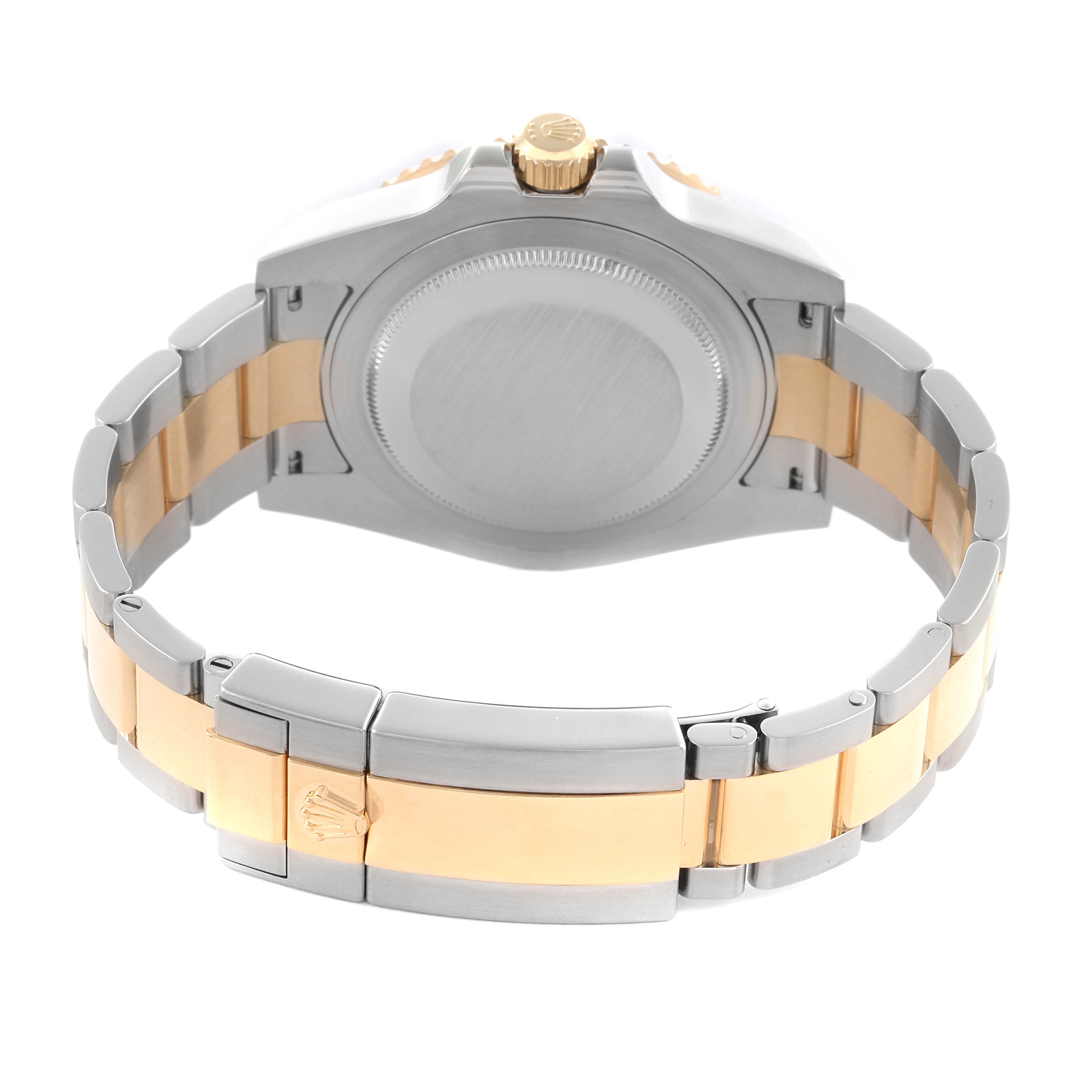 The Rolex GMT-Master 116713 Men's Steel and Gold (two tone) Black Dial 116713 Men's Steel and Gold (two tone) Black Dial is shown from the back, highlighting the closed clasp and two-tone bracelet.