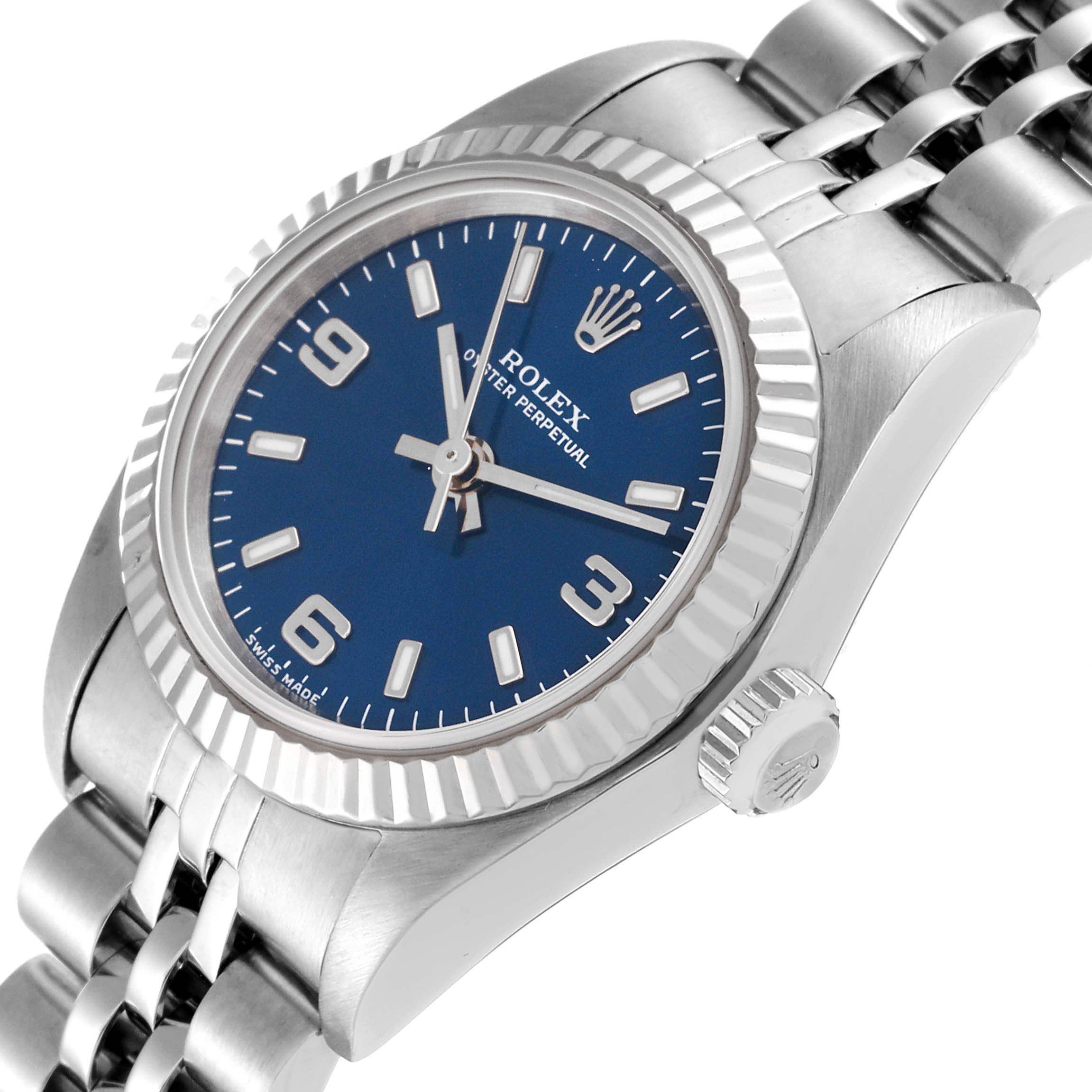 The Rolex Oyster Perpetual 76094 Women's Stainless Steel Blue Dial 76094 Women's Stainless Steel Blue Dial watch is shown at a slight angle, highlighting the blue dial, crown, and bracelet.