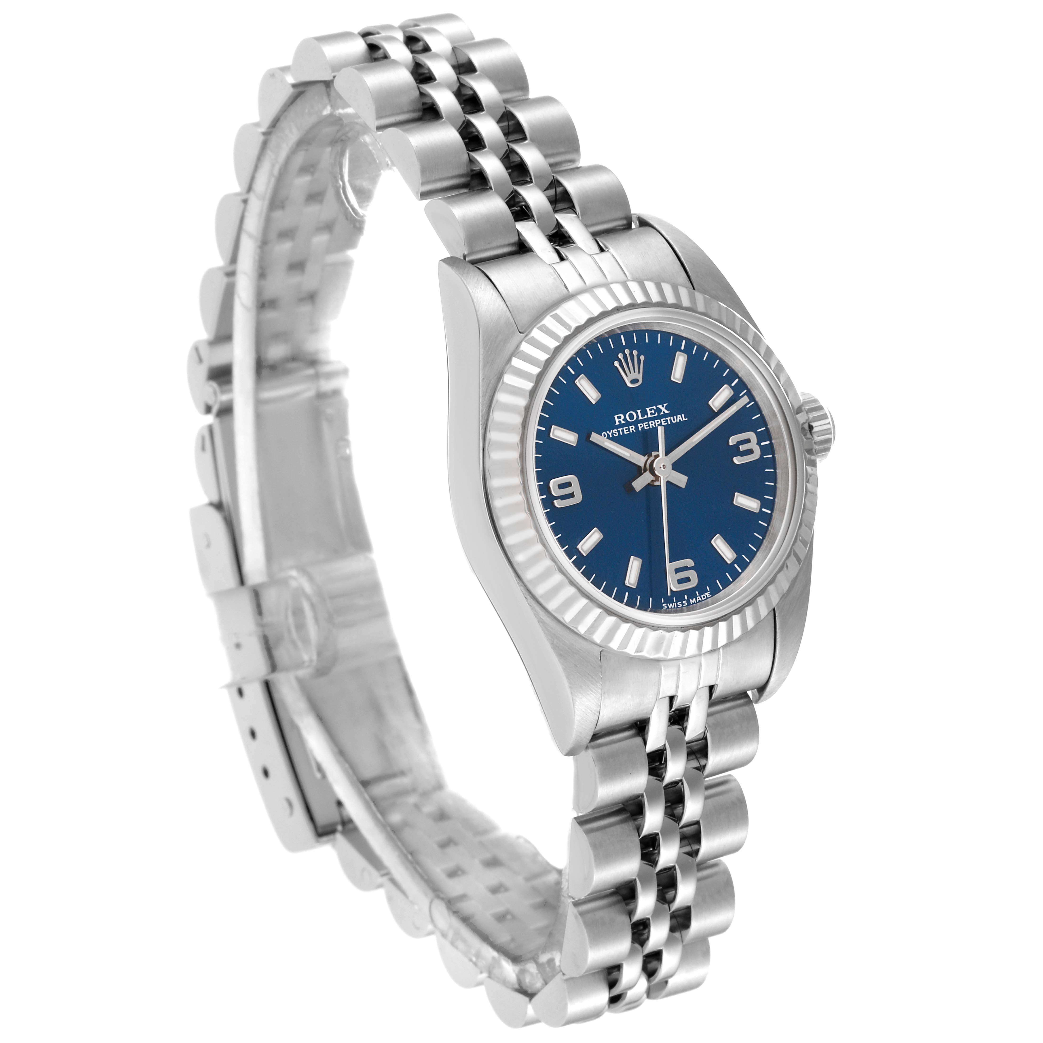 The Rolex Oyster Perpetual 76094 Women's Stainless Steel Blue Dial 76094 Women's Stainless Steel Blue Dial watch is shown at a slight angle, displaying the face, bezel, and bracelet.