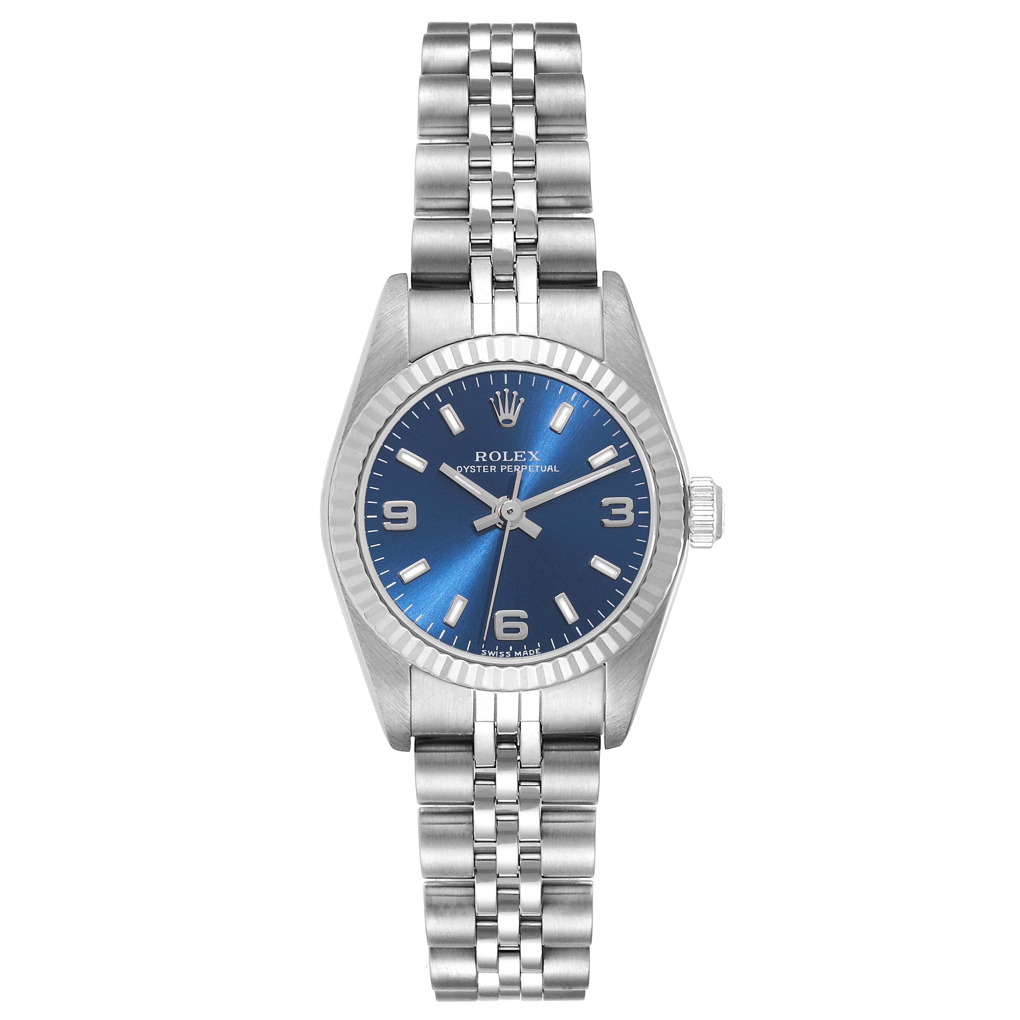 This Rolex Oyster Perpetual 76094 Women's Stainless Steel Blue Dial 76094 Women's Stainless Steel Blue Dial watch is shown from the front, featuring a metallic band and a blue dial.