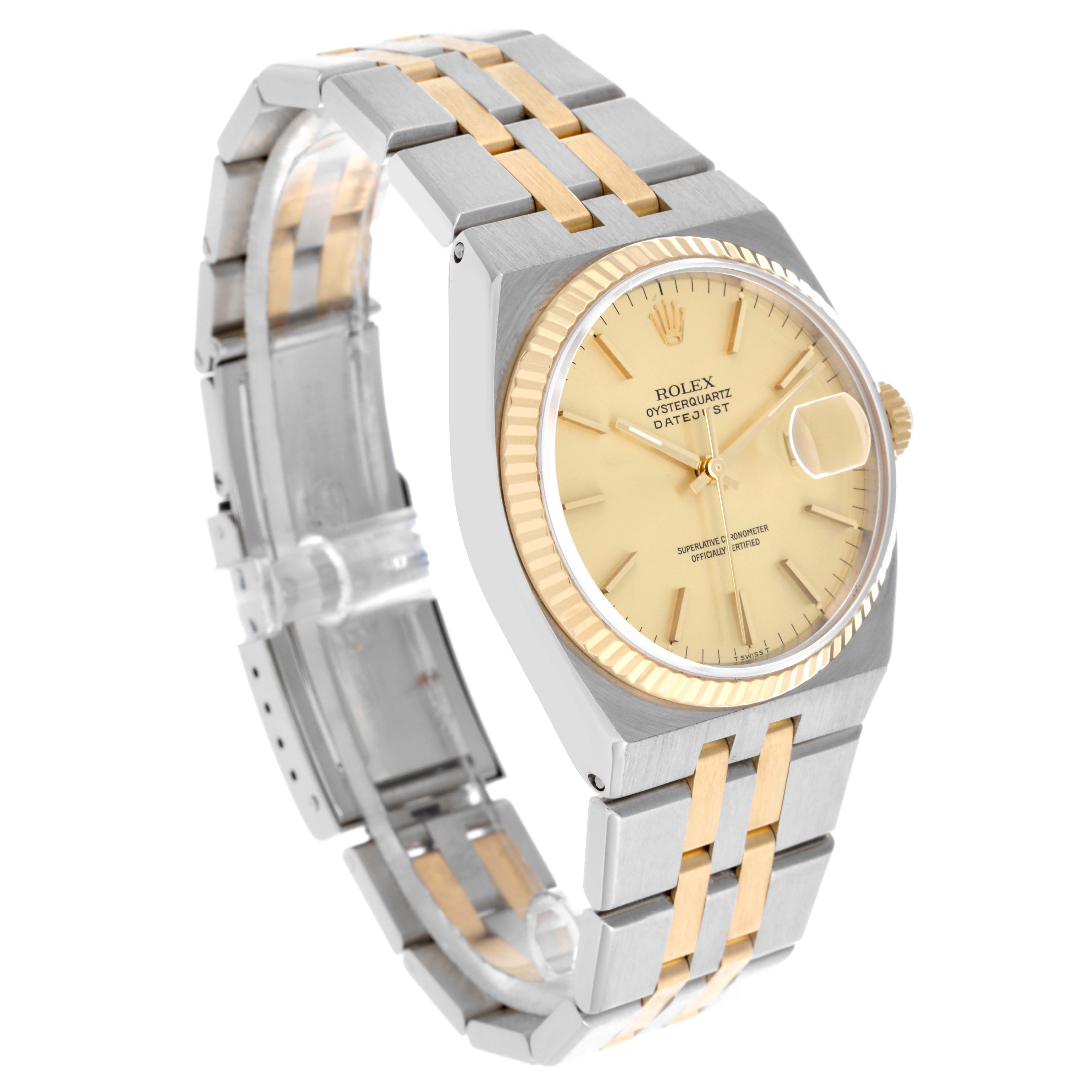 The Rolex Oysterquartz 17013 Men's Steel and Gold (two tone) Champagne Dial 17013 Men's Steel and Gold (two tone) Champagne Dial watch is shown from an angled side view, highlighting its face, bezel, and two-tone bracelet.