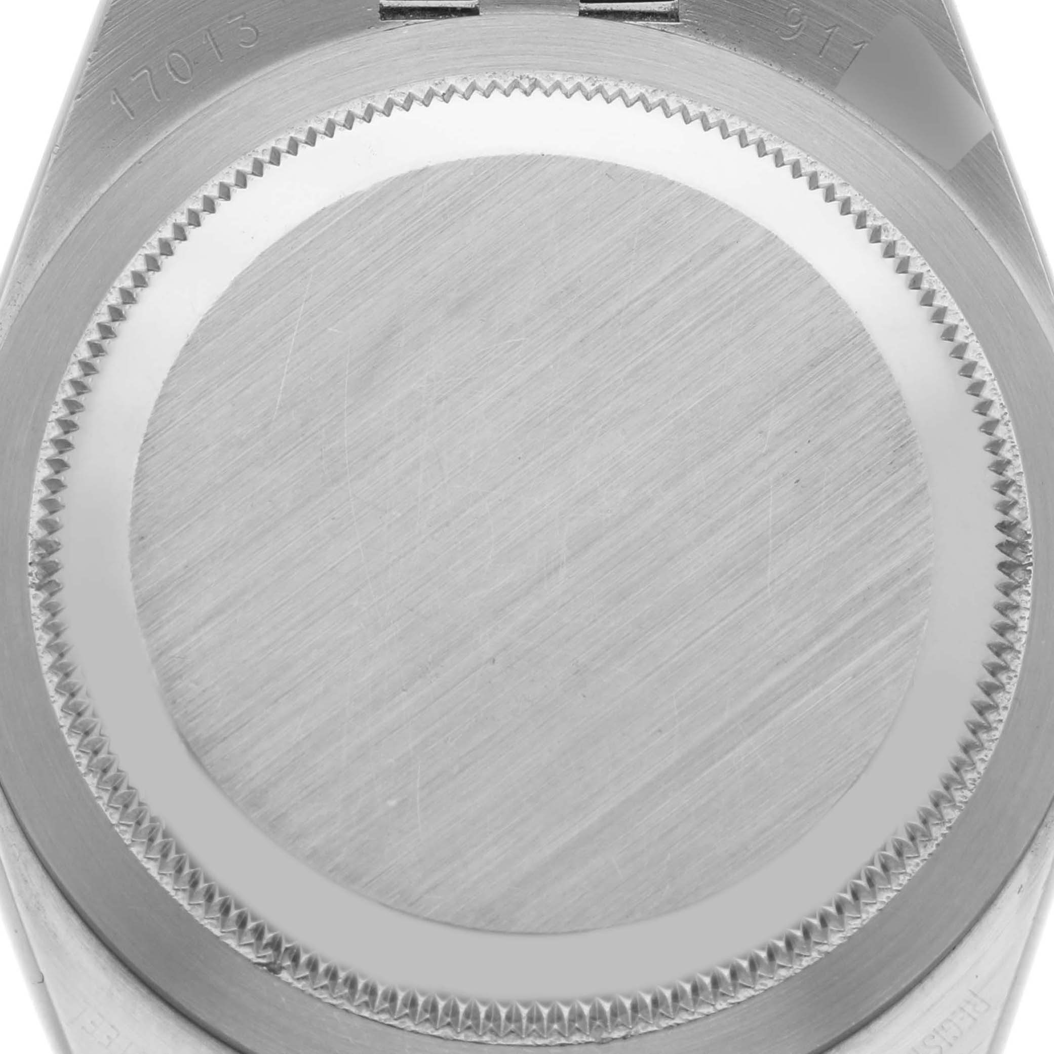 The image shows the back casing of a Rolex Oysterquartz 17013 Men's Steel and Gold (two tone) Champagne Dial 17013 Men's Steel and Gold (two tone) Champagne Dial watch, viewed from a direct angle.