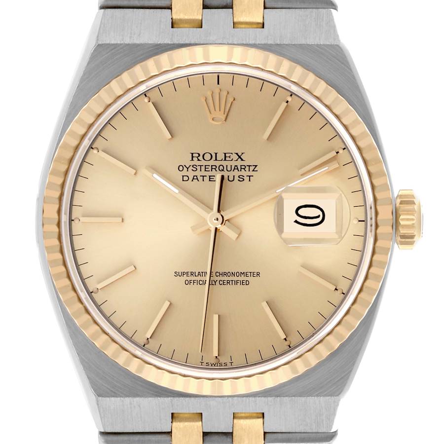 The Rolex Oysterquartz watch is shown from the front, highlighting the dial, gold bezel, and part of the bracelet.