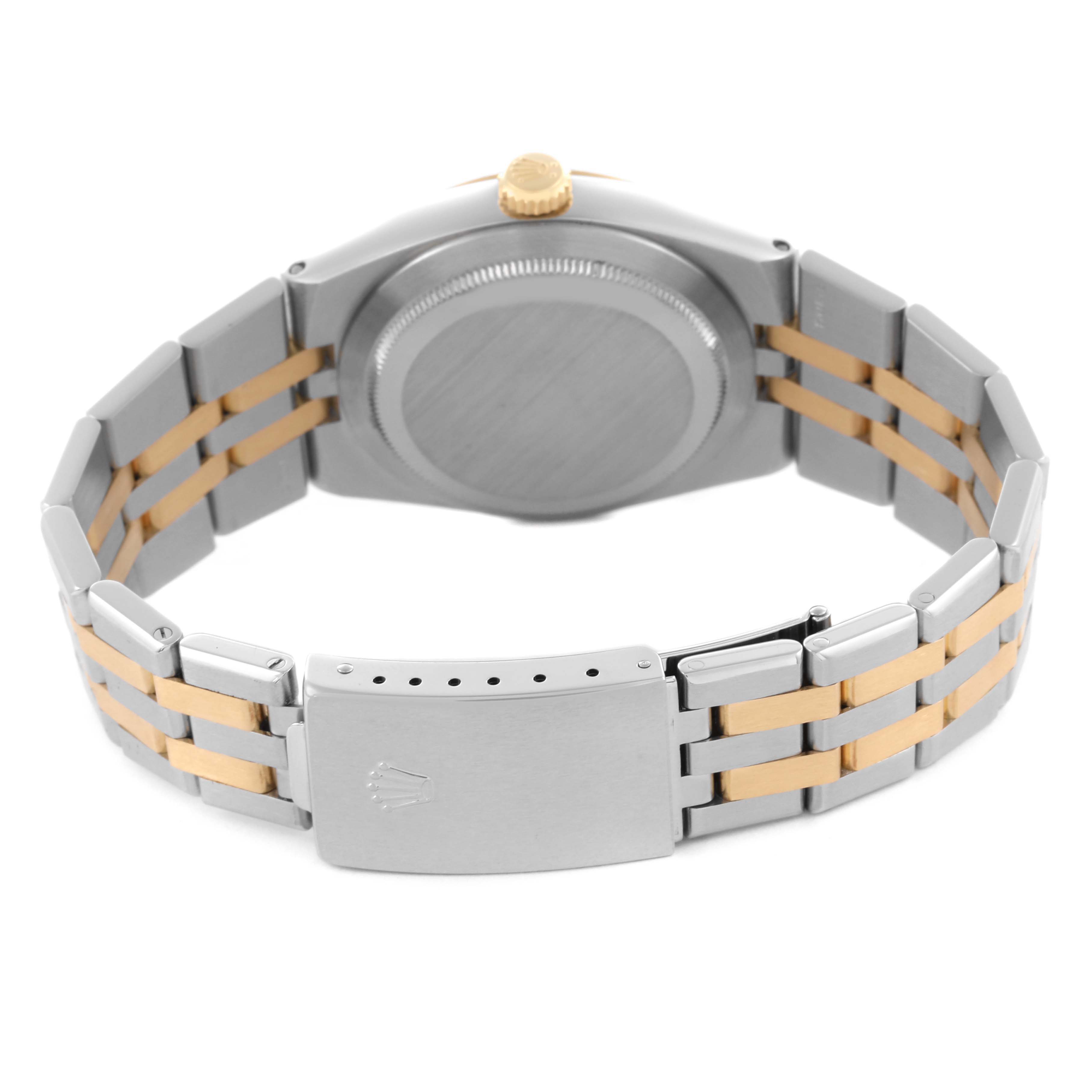 The image shows the back and side view of a Rolex Oysterquartz 17013 Men's Steel and Gold (two tone) Champagne Dial 17013 Men's Steel and Gold (two tone) Champagne Dial, displaying the clasp, band, and crown.