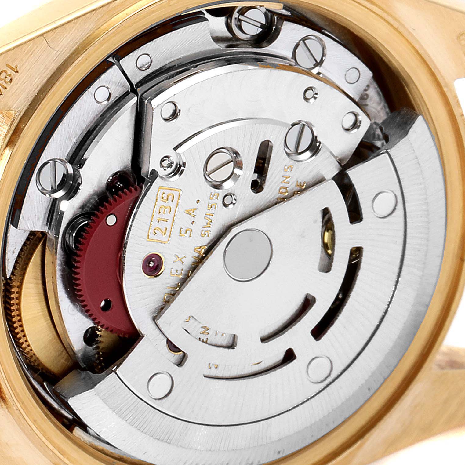 This image shows the interior mechanical movement of a Rolex President 69278 Women's Yellow Gold Champagne Dial 69278 Women's Yellow Gold Champagne Dial model watch viewed from the back, showcasing various gears and components.