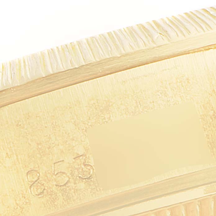 This is a close-up of the bezel and serial number engraved on the President model by Rolex.