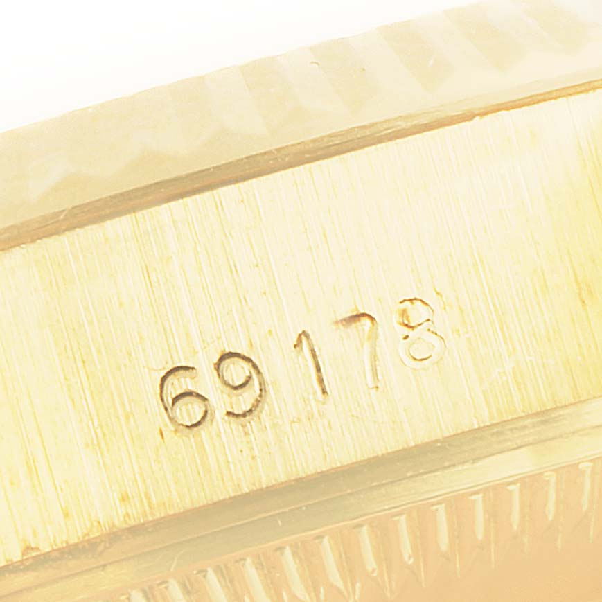 This close-up image shows the reference number "69178" engraved on the side of a Rolex President 69178 Women's Yellow Gold Champagne Dial 69178 Women's Yellow Gold Champagne Dial model watch.