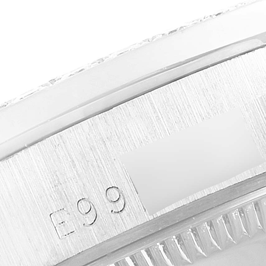 This image shows a close-up of the case back and part of the bezel of a Rolex President 68289 Women's White Gold Silver Dial 68289 Women's White Gold Silver Dial model.