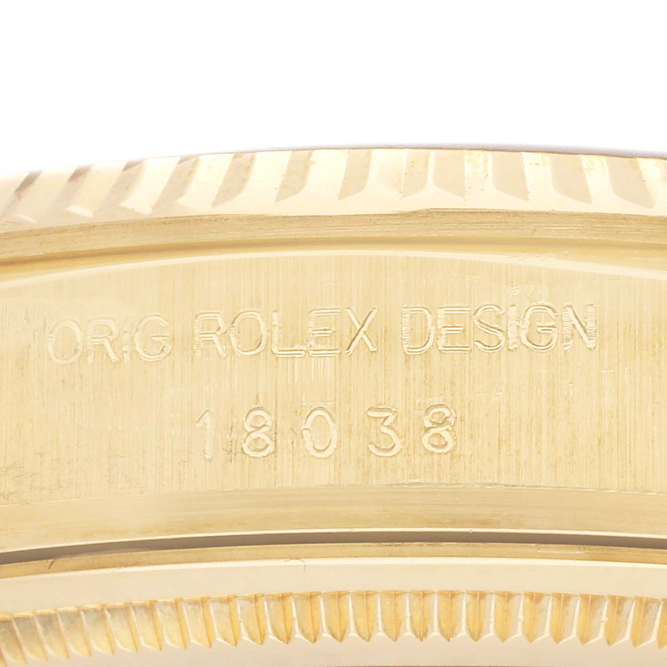The image shows a close-up of the case side and bezel of a Rolex President 18038 Men's Yellow Gold Silver Dial model, highlighting the engraved model number.