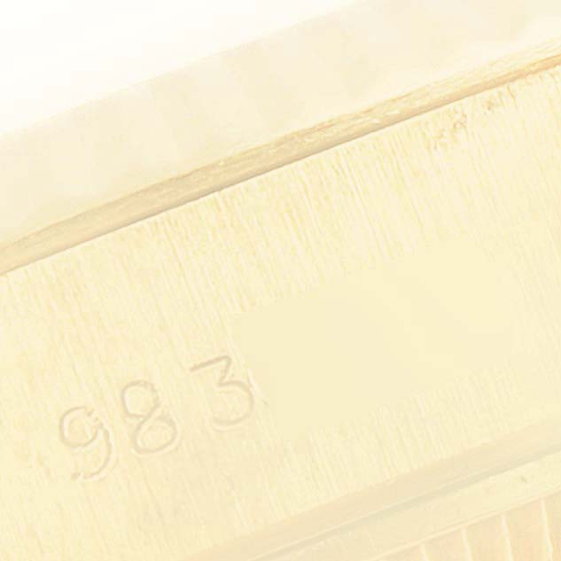 This close-up image shows part of the bracelet clasp of the Rolex President 69178 Women's Yellow Gold Blue Dial 69178 Women's Yellow Gold Blue Dial model watch.