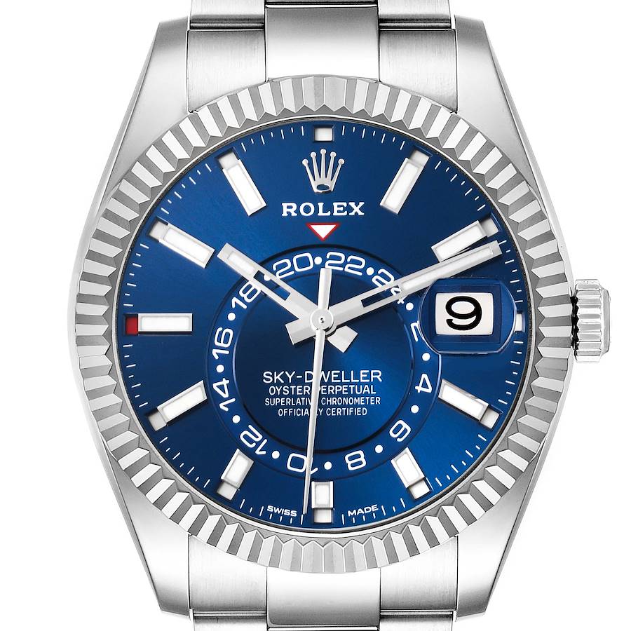 The Rolex Sky-Dweller watch is shown from a front angle, highlighting the dial, bezel, and bracelet.